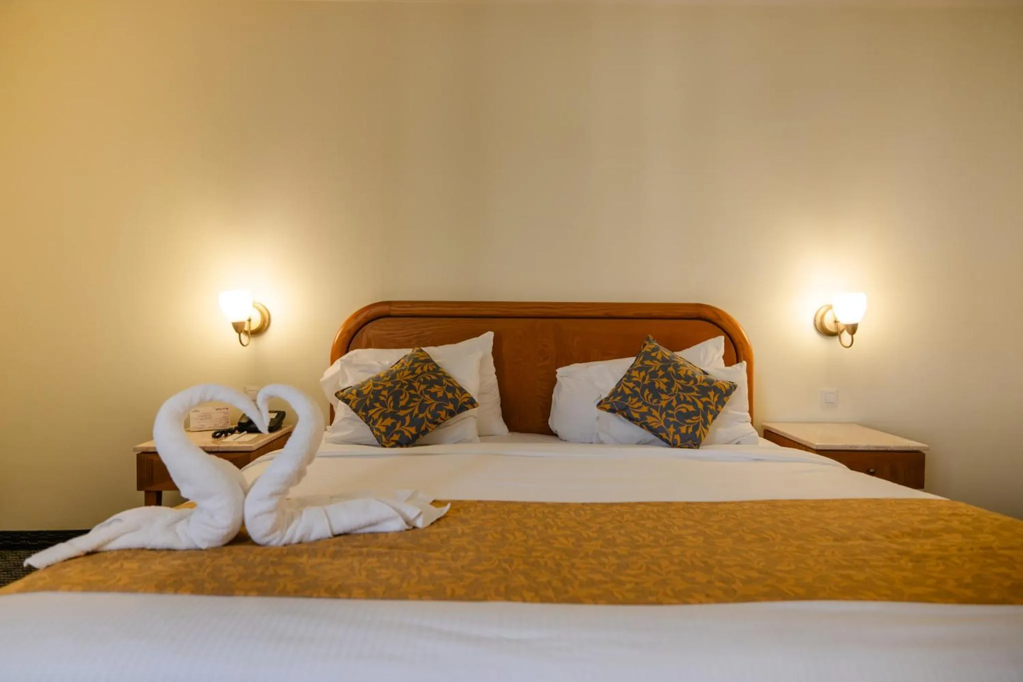 Bedroom, Bed in Grand Court Hotel