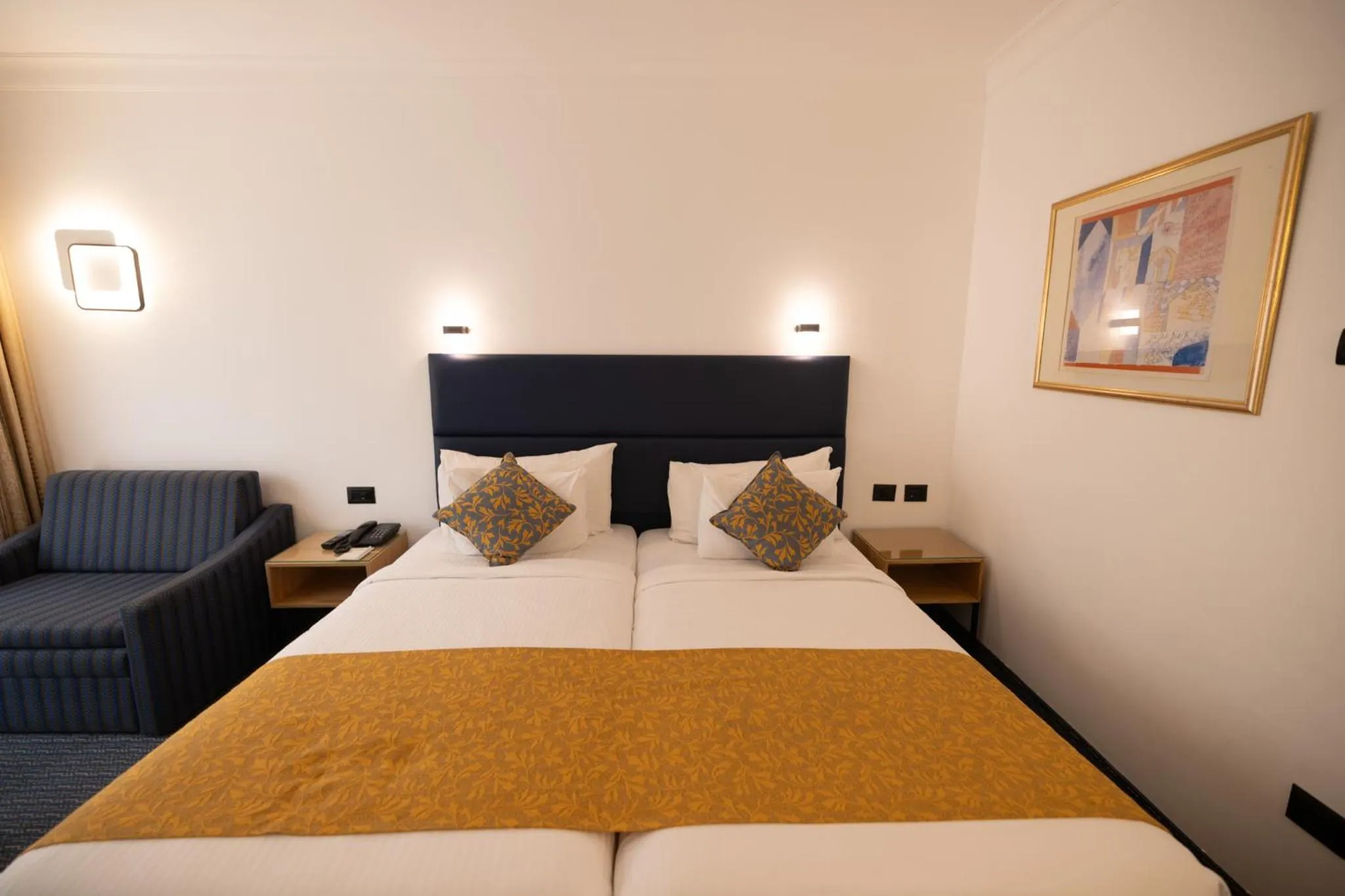 Bedroom, Bed in Grand Court Hotel