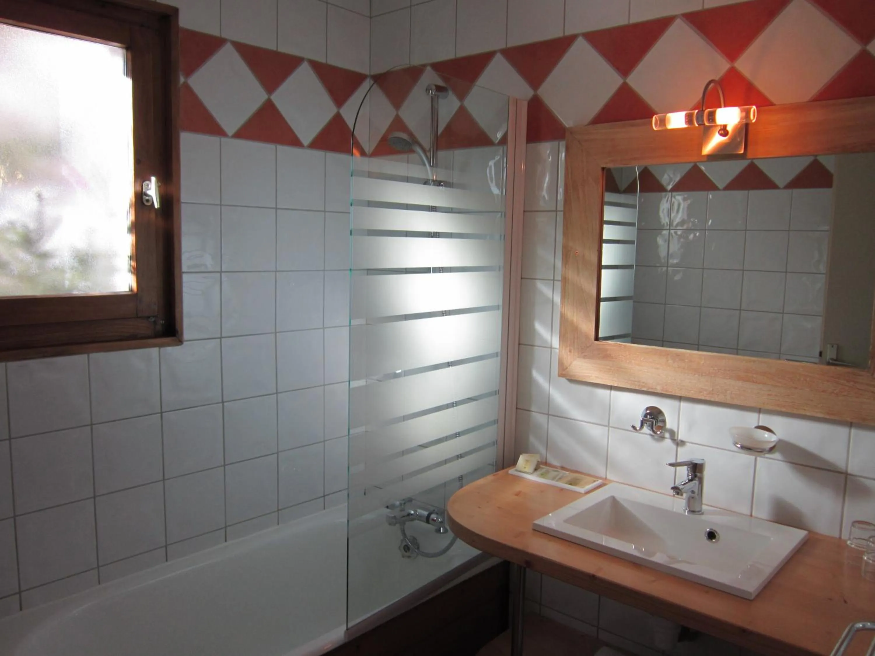 Bathroom in Logis Hotel Gai Soleil