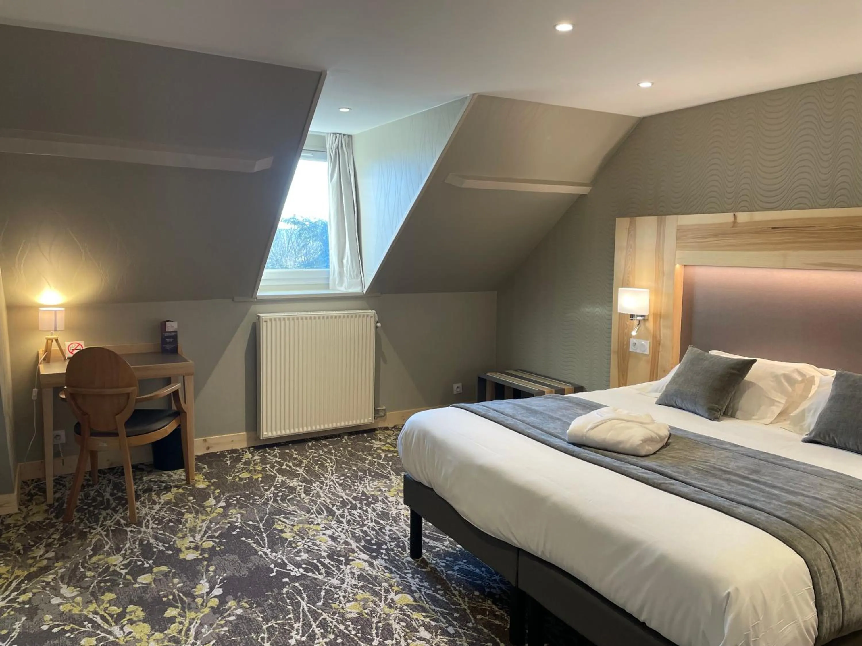 Bed in Hotel Le Cercle