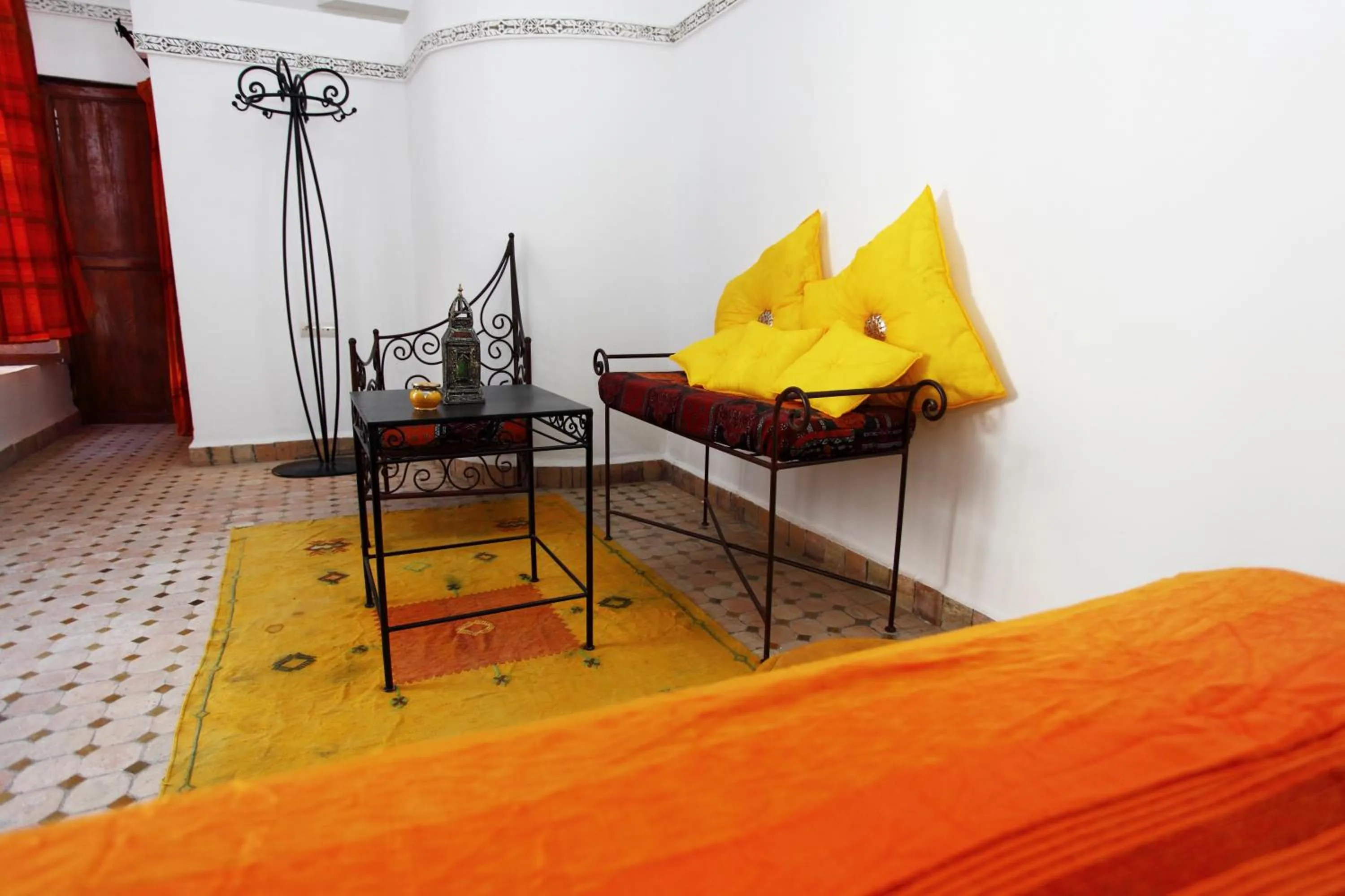 Seating area, Bed in Riad Jamaï