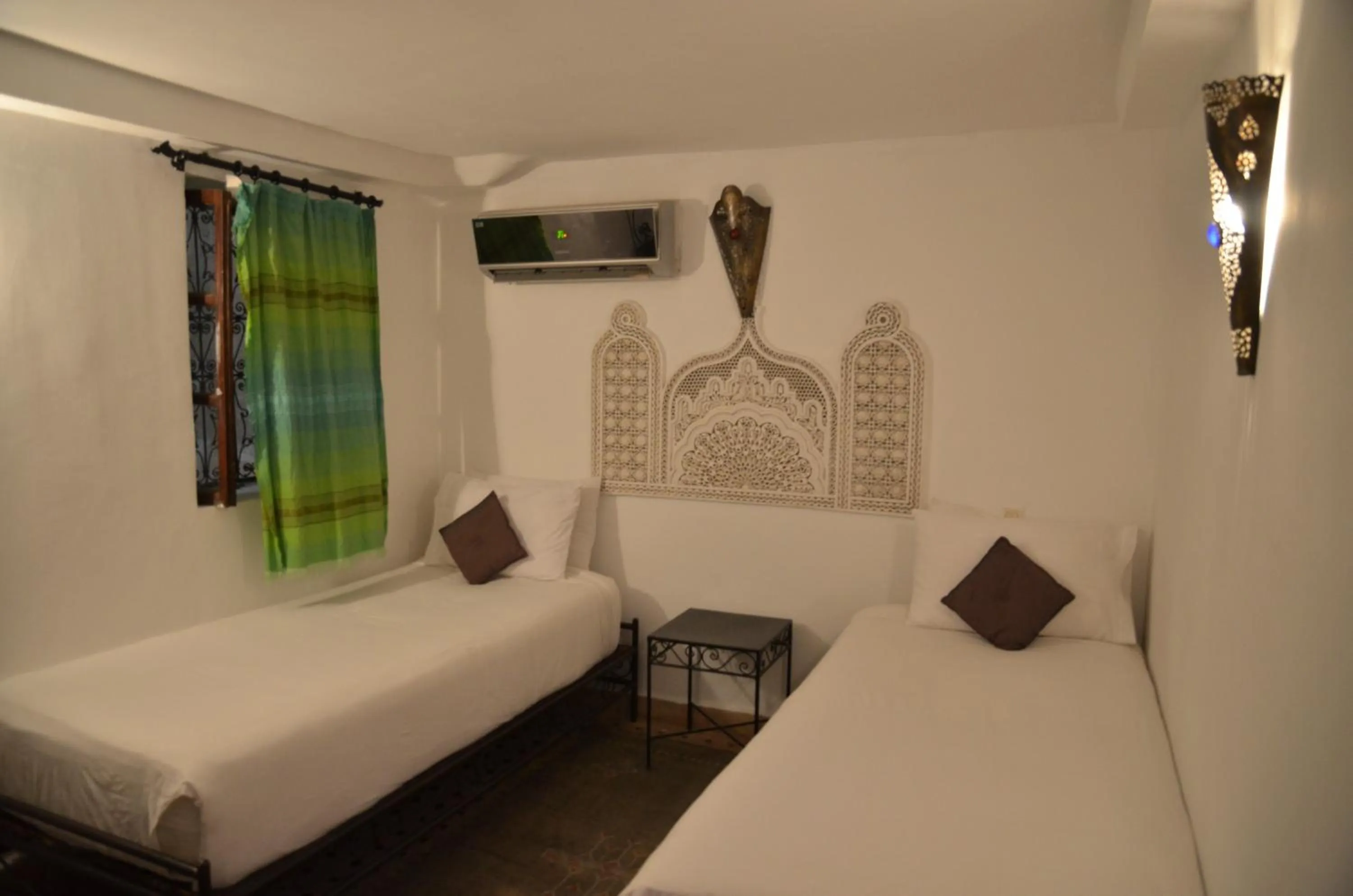 Bed in Riad Jamaï