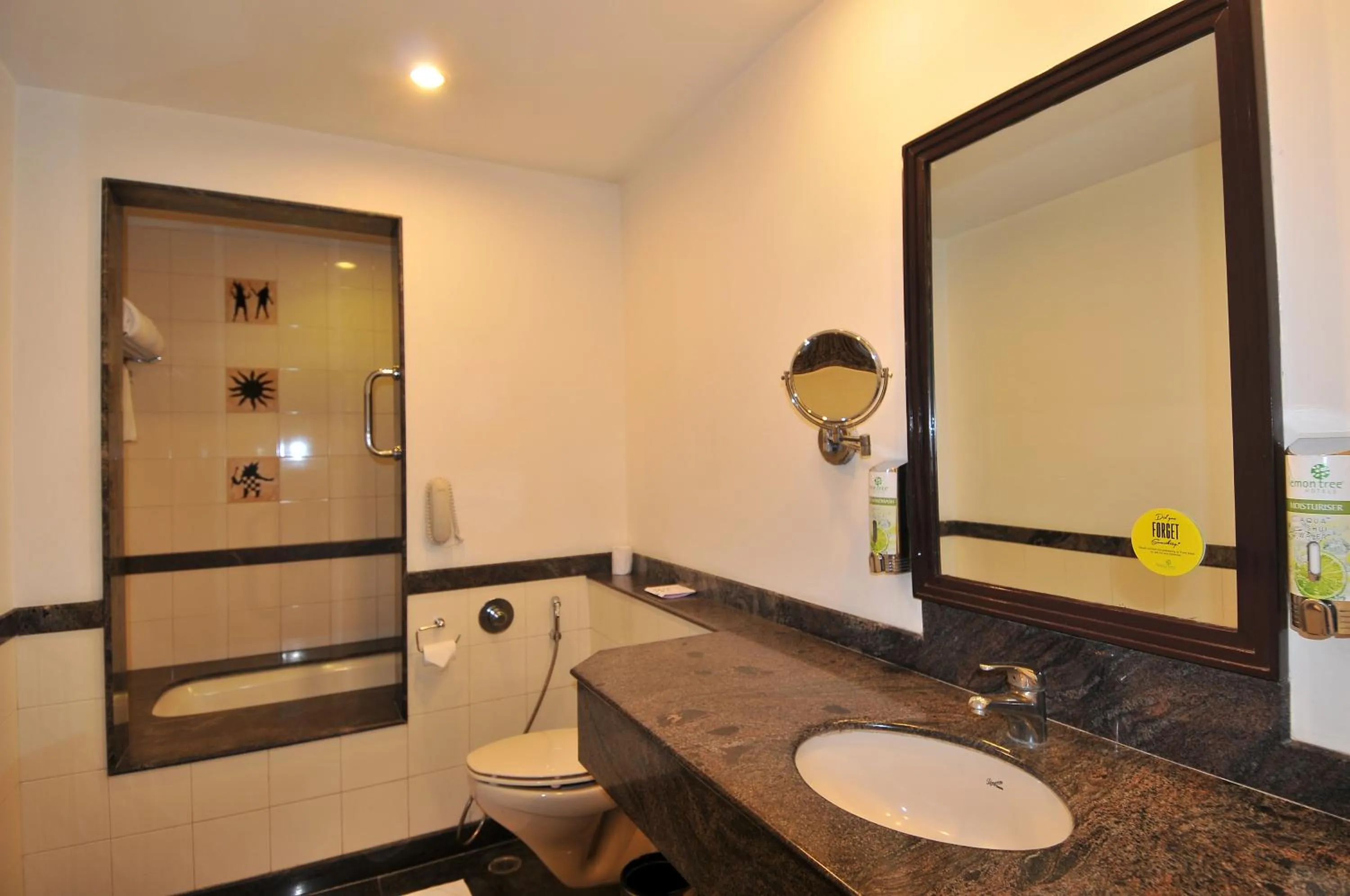 Bathroom in Lemon Tree Hotel, East Delhi Mall, Kaushambi