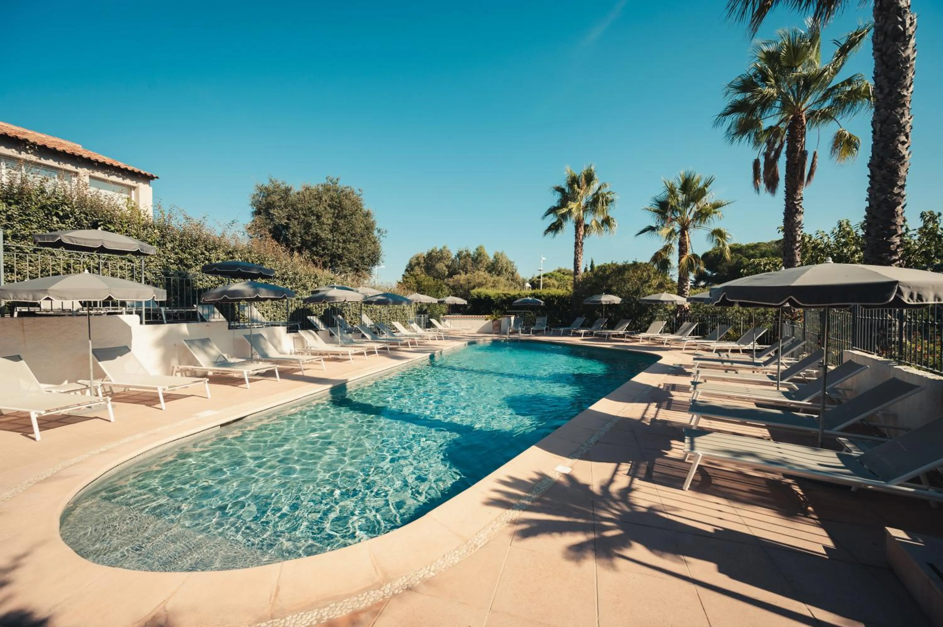 Swimming pool in Van der Valk Hotel Le Catalogne Saint Aygulf