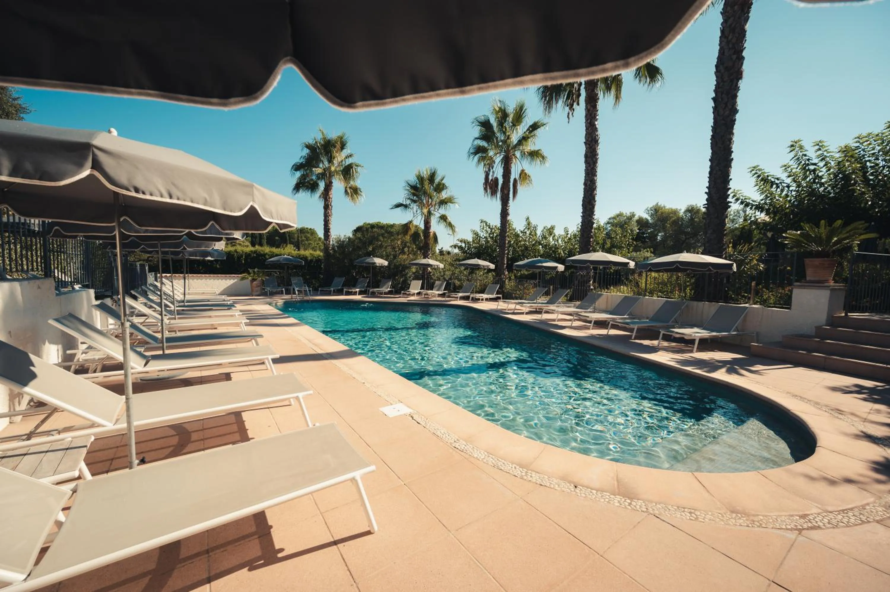 Swimming pool in Van der Valk Hotel Le Catalogne Saint Aygulf