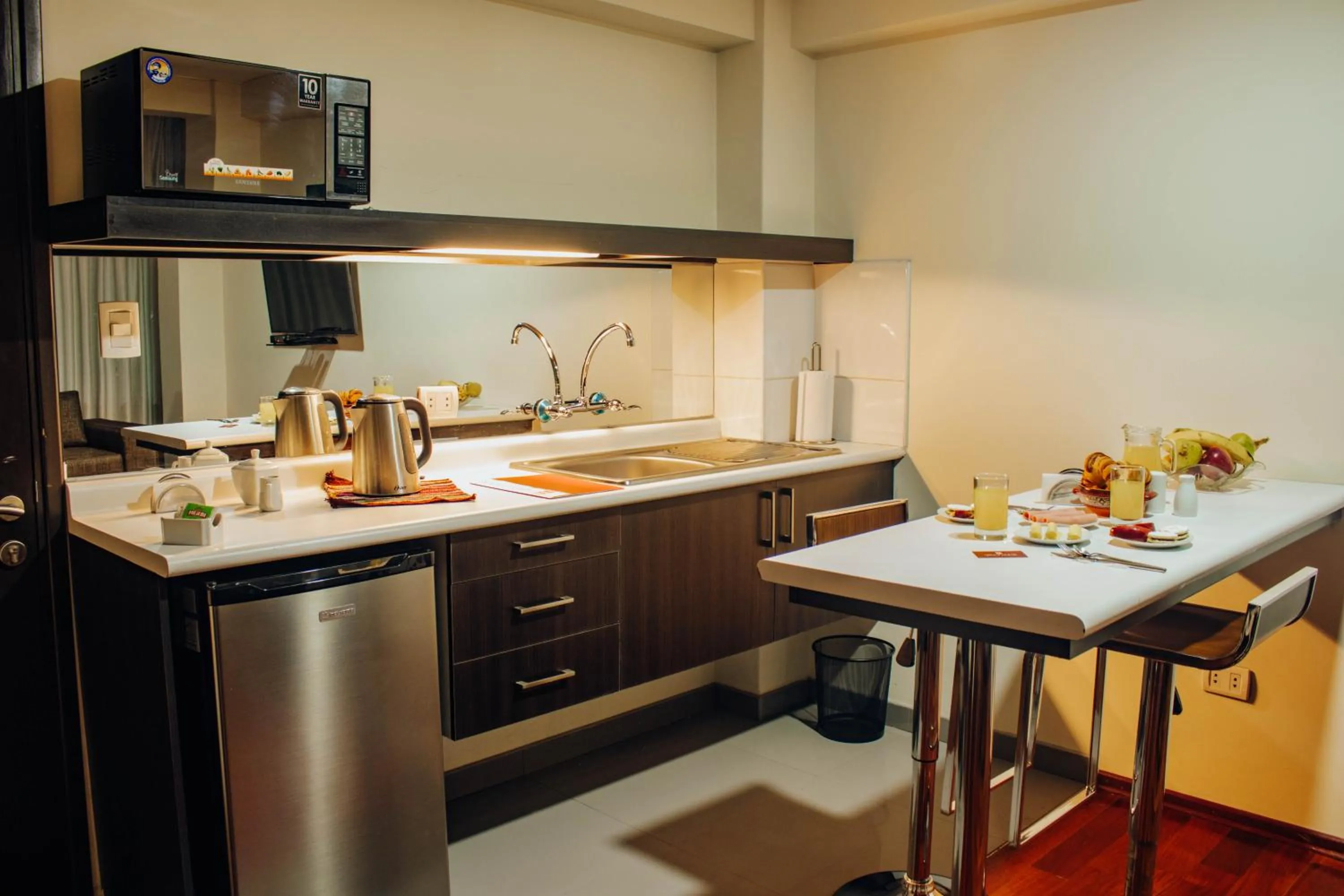 Kitchen or kitchenette in Group House Apart Hotel