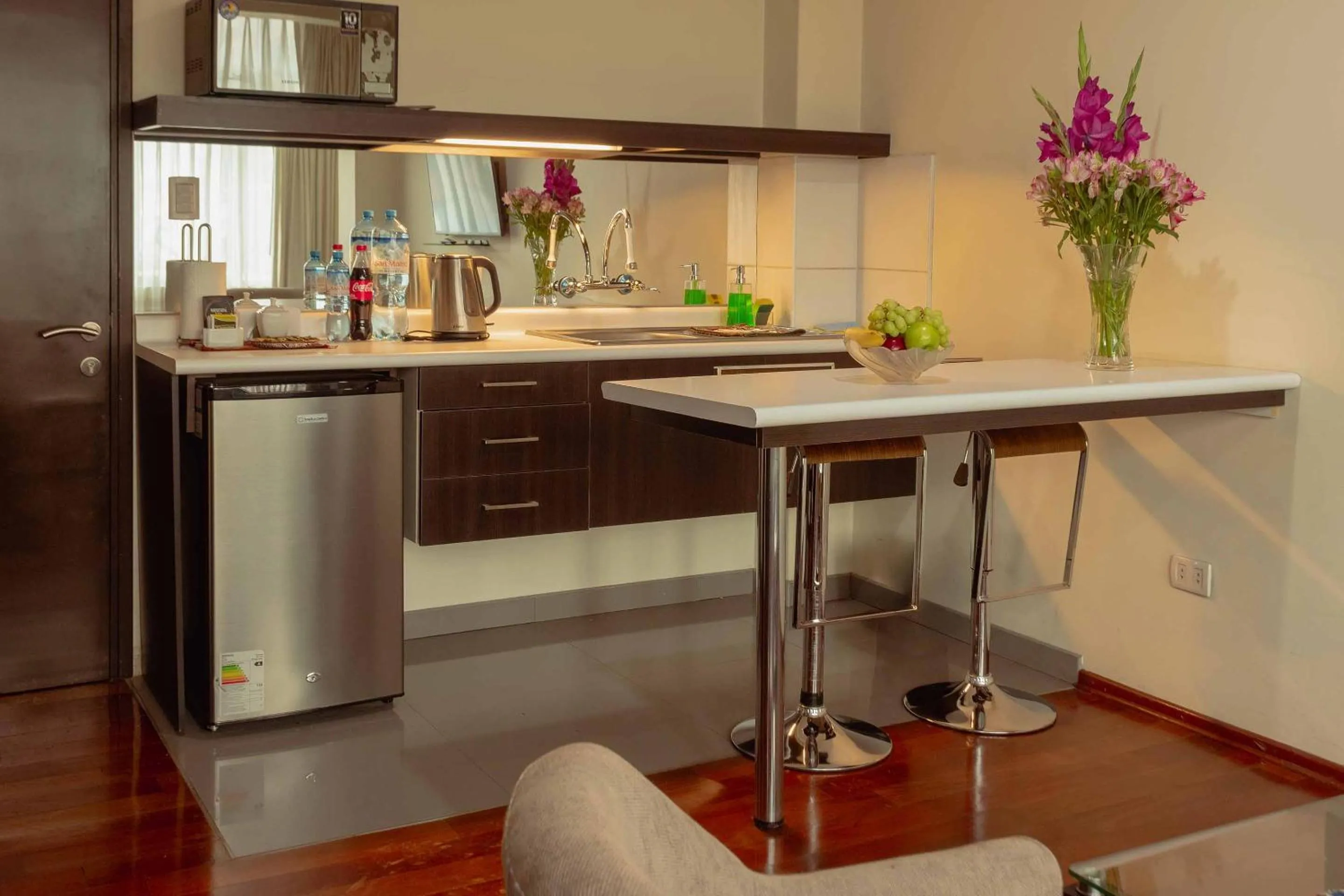 Kitchen or kitchenette in Group House Apart Hotel