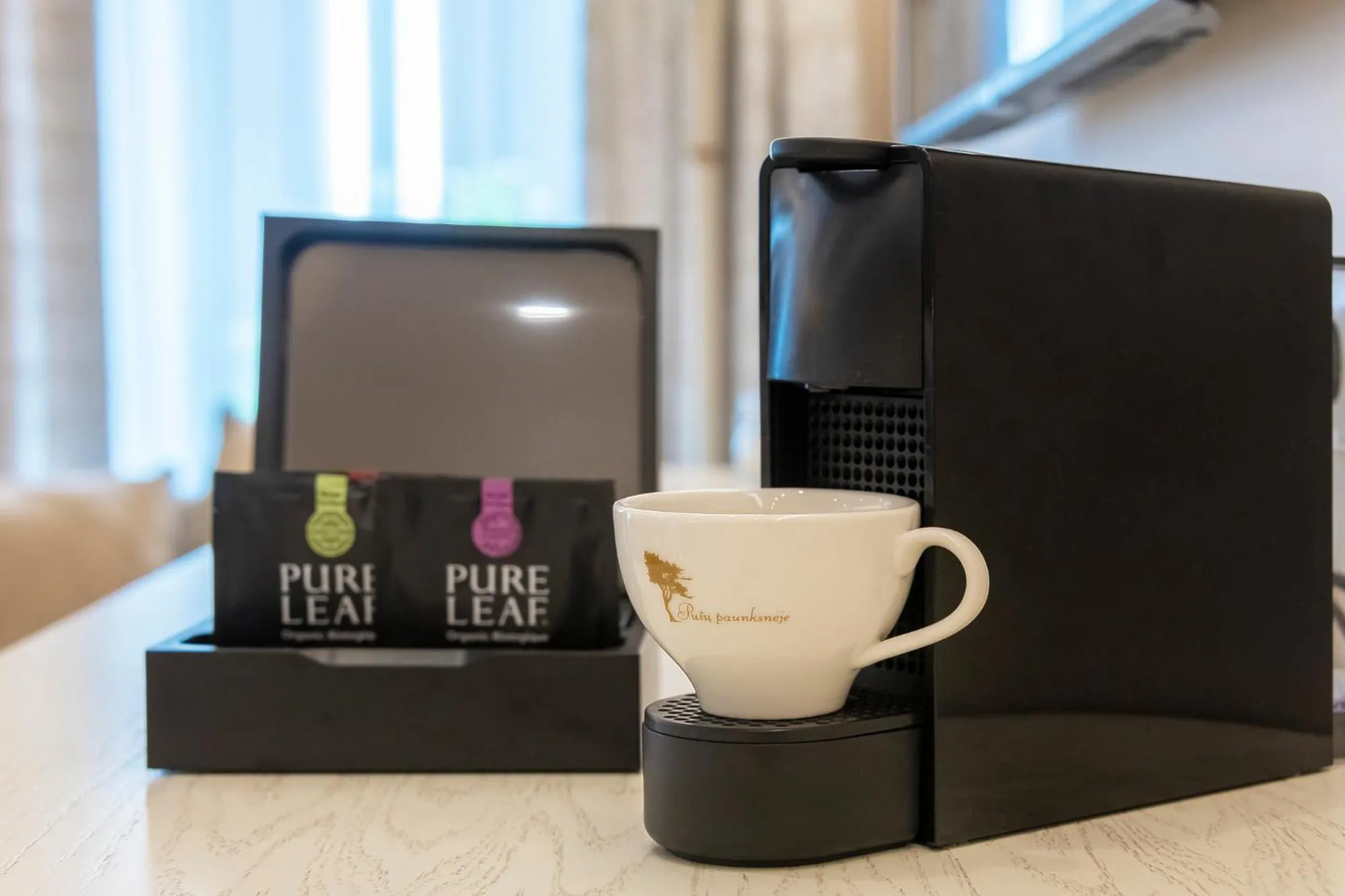 Coffee/tea facilities in Hotel Pušų paunksnėje