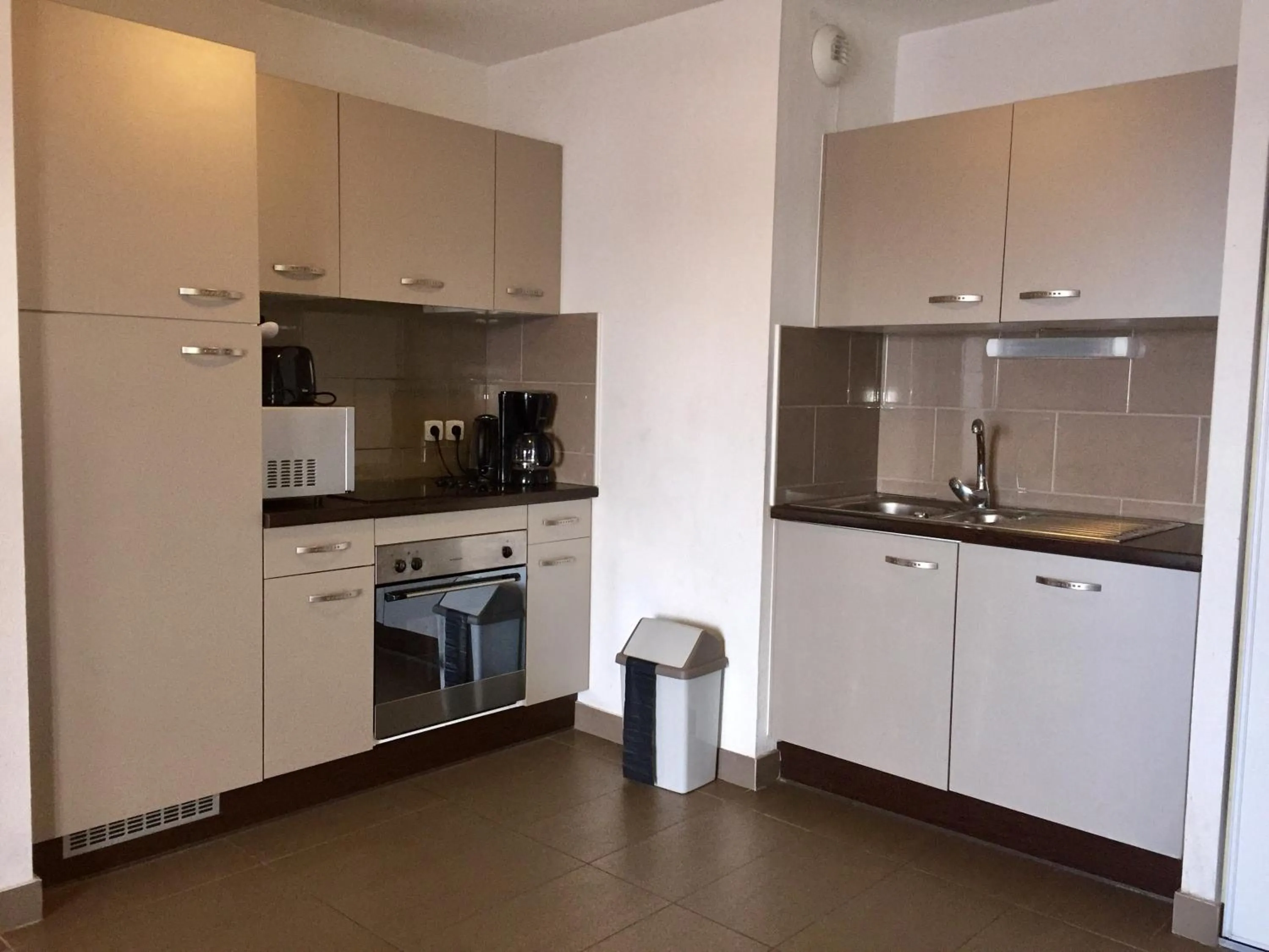 Kitchen or kitchenette in Lagrange Vacances Le Pic de l'Ours