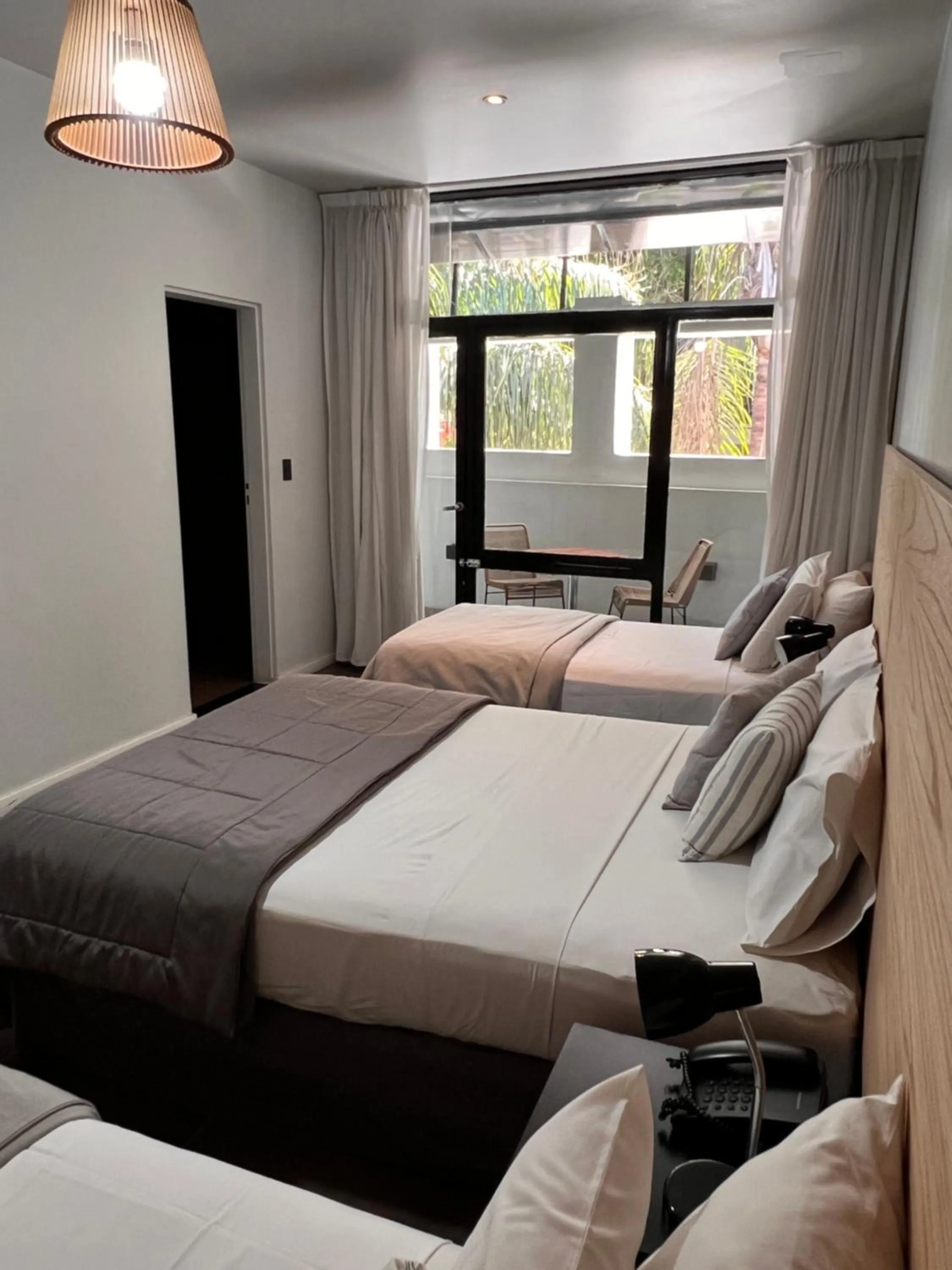 Bed in 5411 Soho Hotel