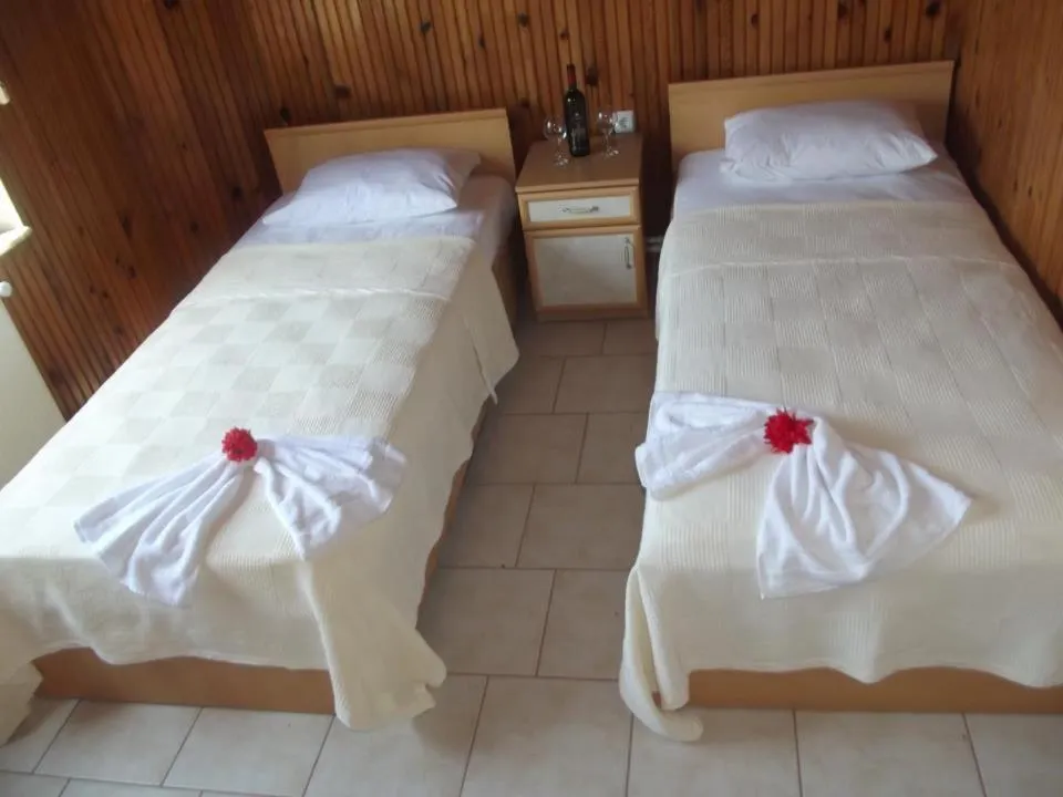 Bed in Hamsilos Apart Hotel