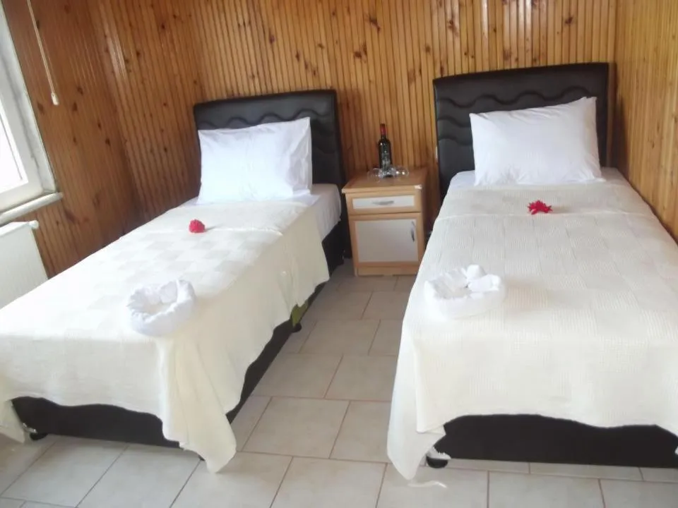 Bed in Hamsilos Apart Hotel