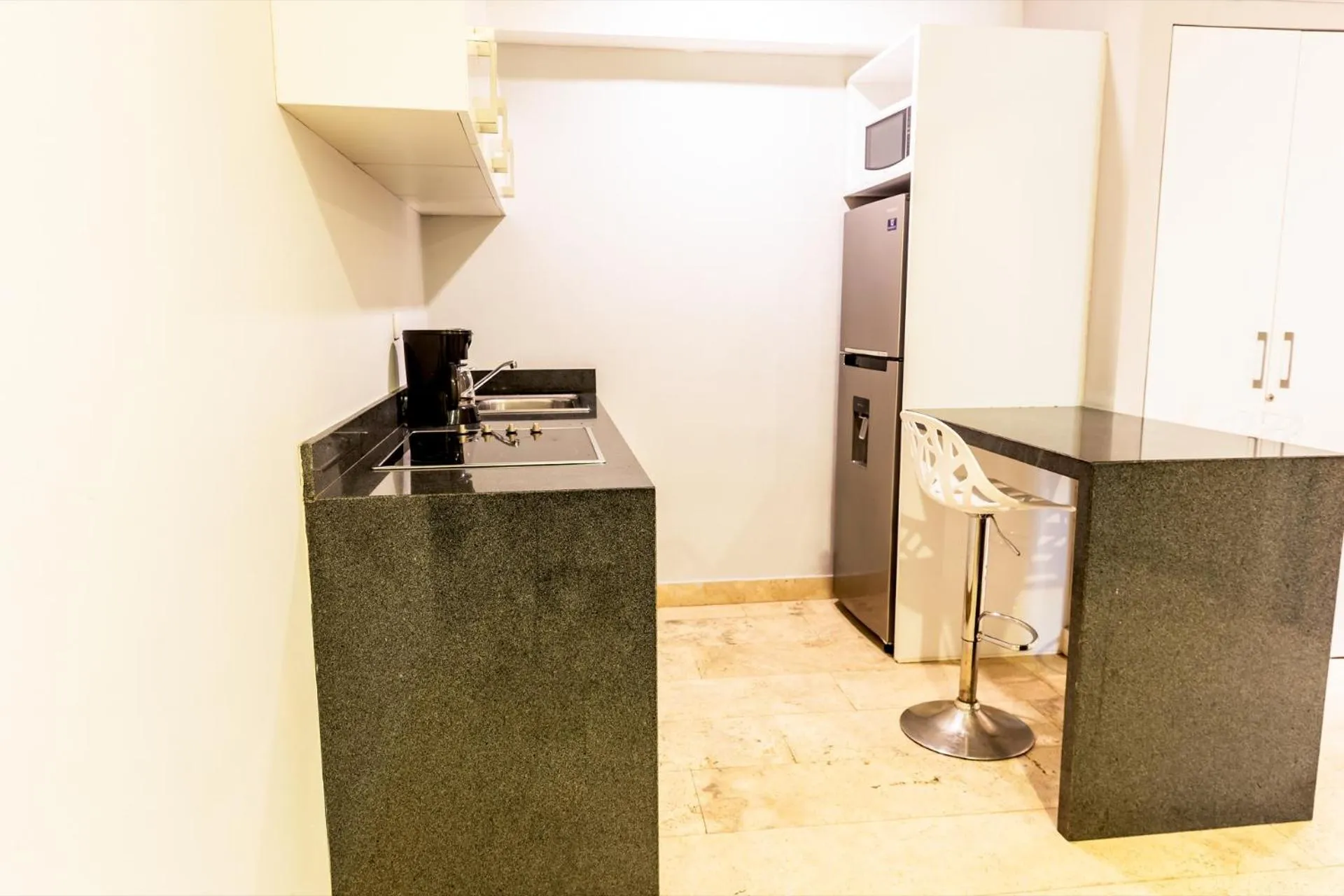 Kitchen or kitchenette in Hotelito del Mar Playa del Carmen