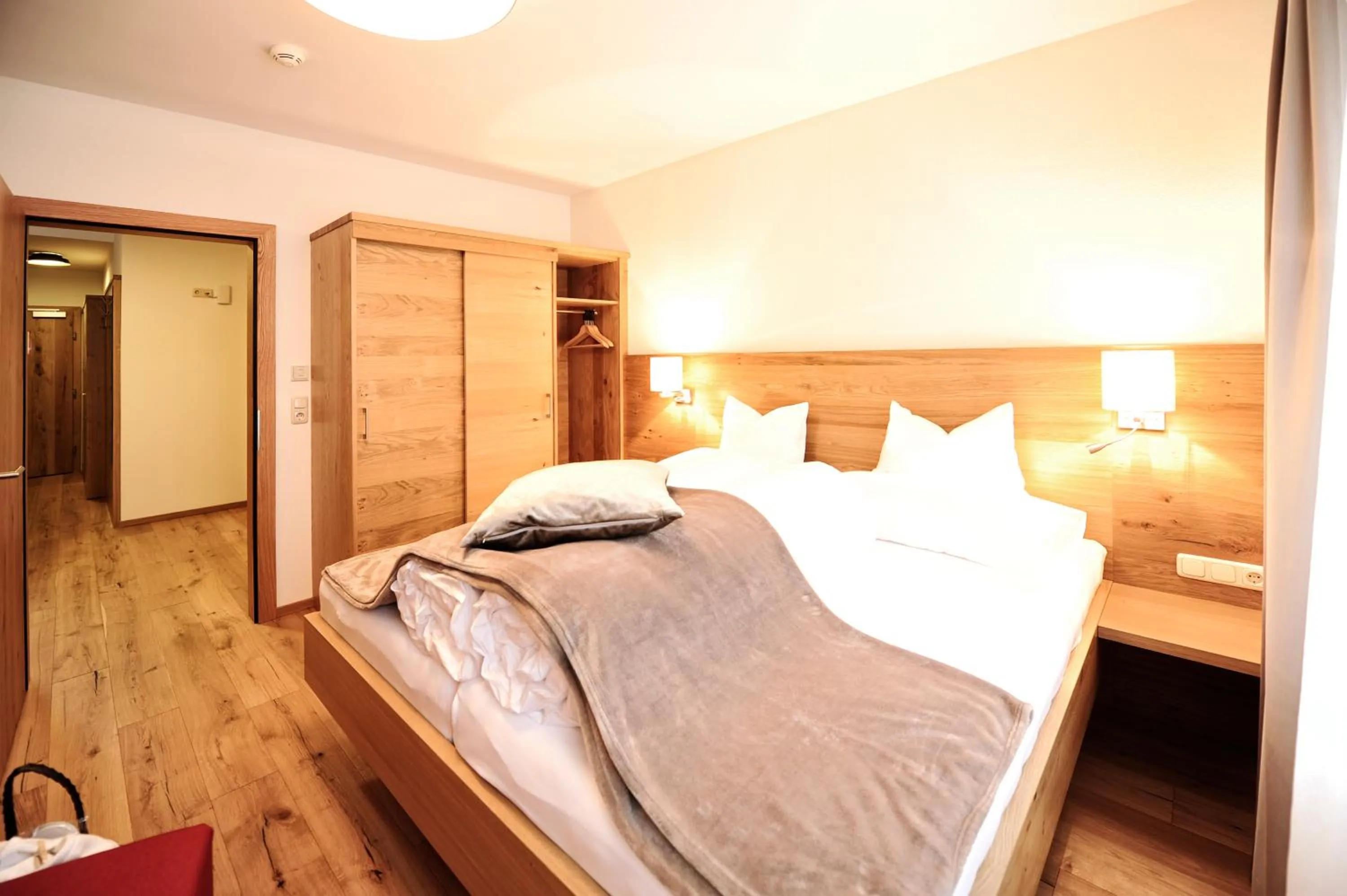 Communal lounge/ TV room, Bed in Hotel Dorfstadl