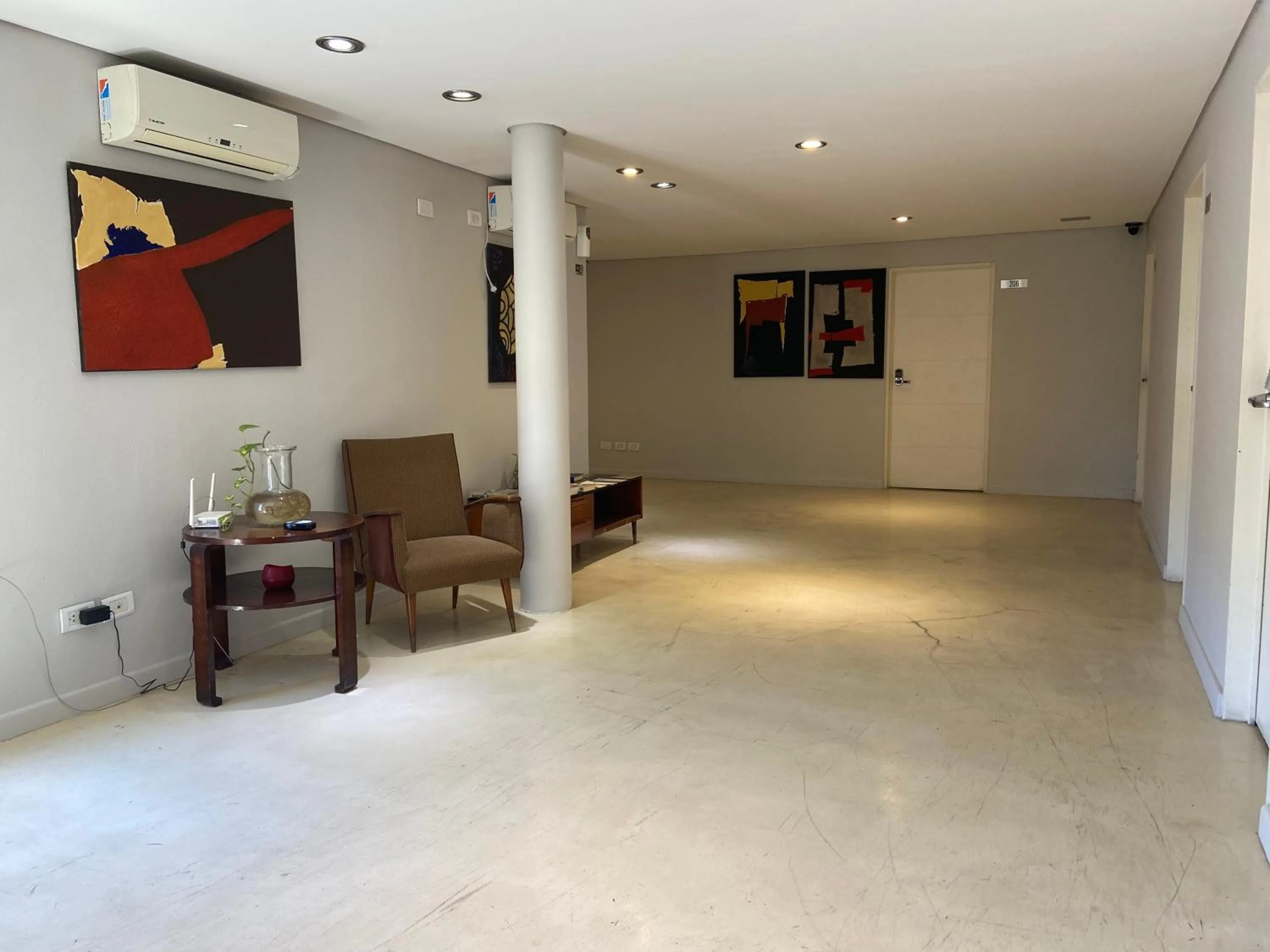 Seating area in First Palermo Hotel