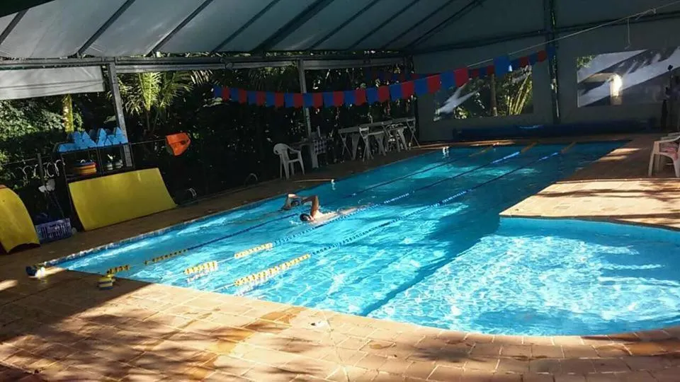 Swimming pool in Aconchego 3 dorms, piscina, churrasq em Condomínio Fechado
