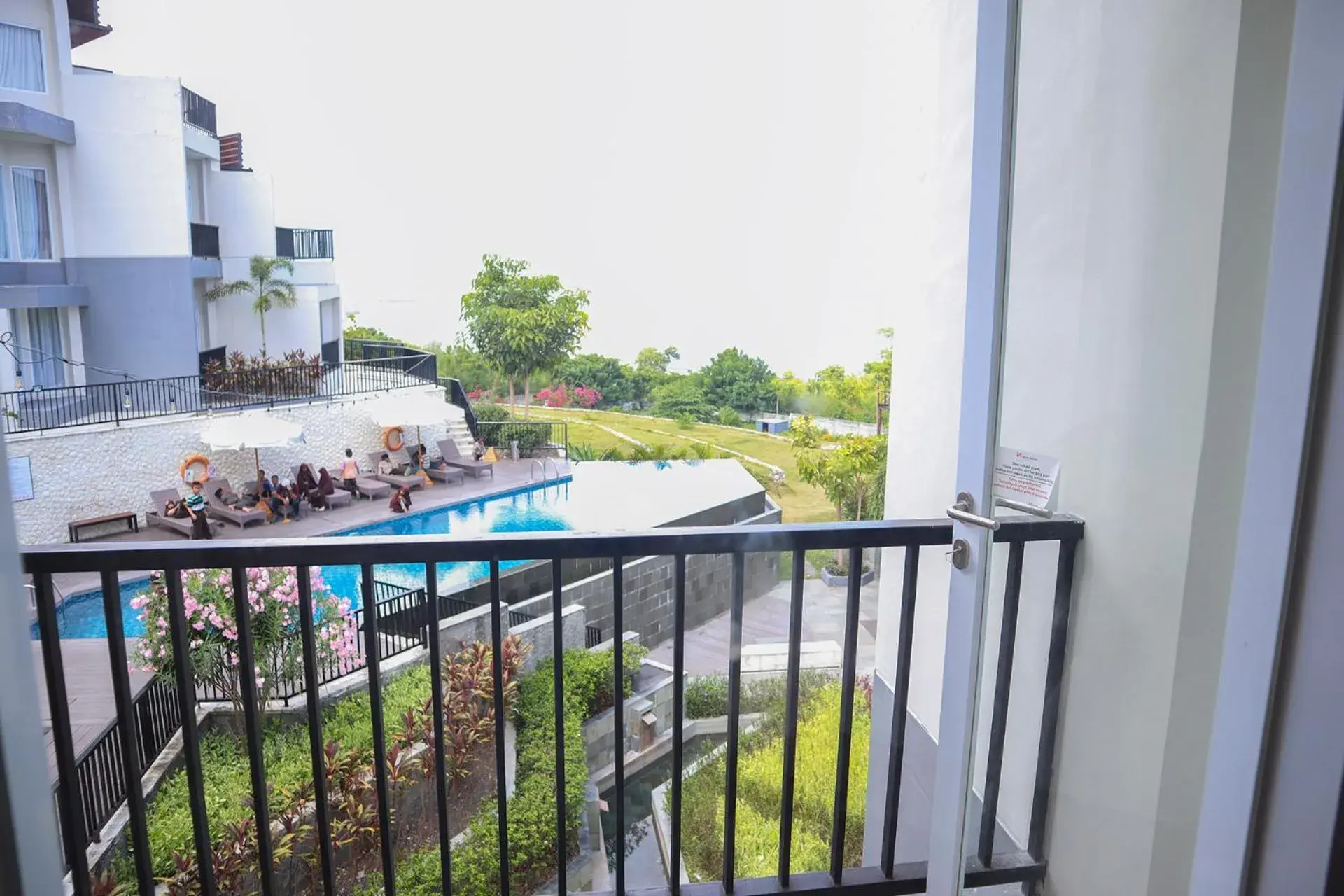 Deluxe Double Room with Pool View in Swiss-Belinn Luwuk Deluxe Double Room with Pool View in Swiss-Belinn Luwuk