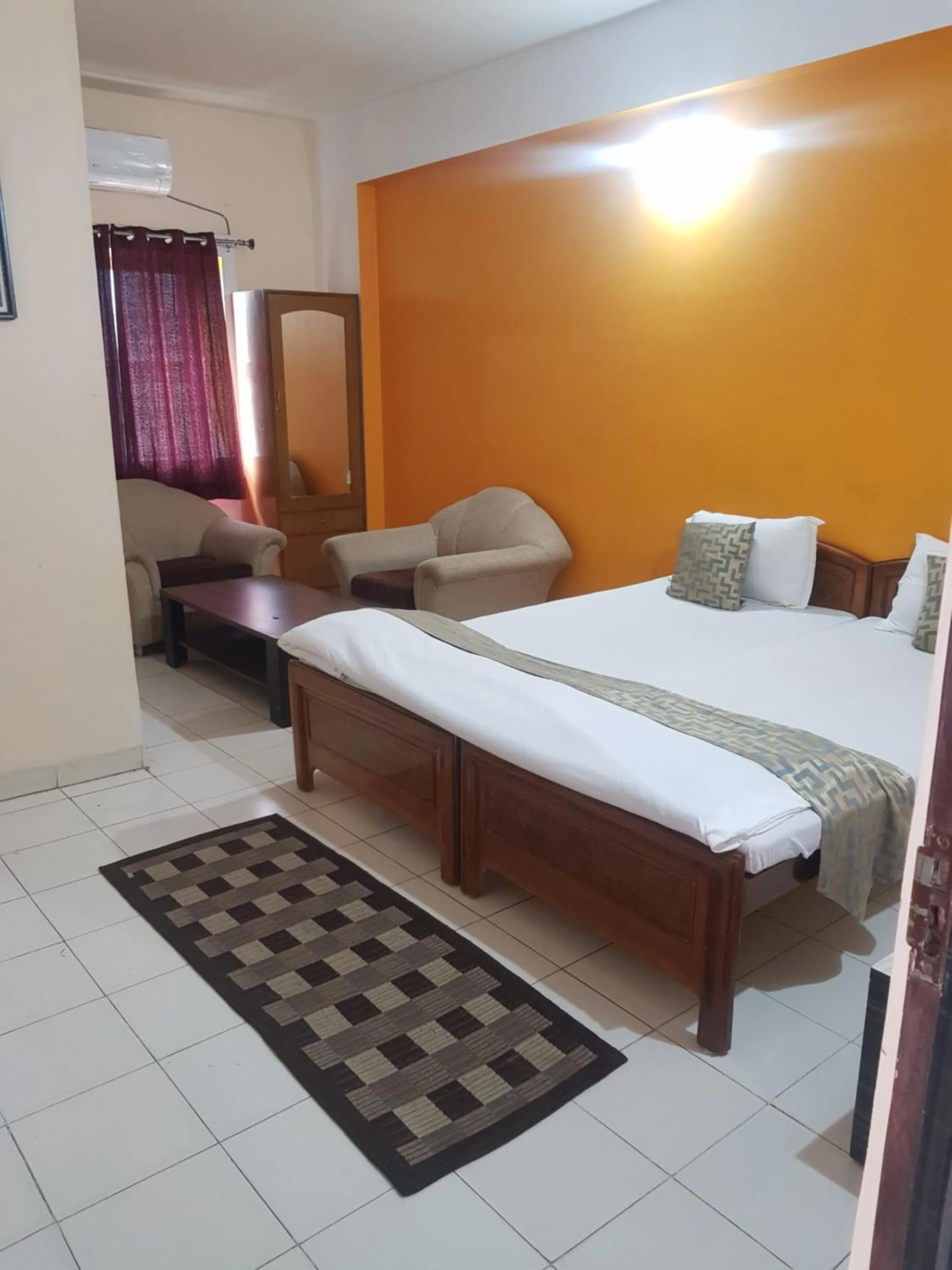 Photo of the whole room, Bed in Hotel Arham Inn