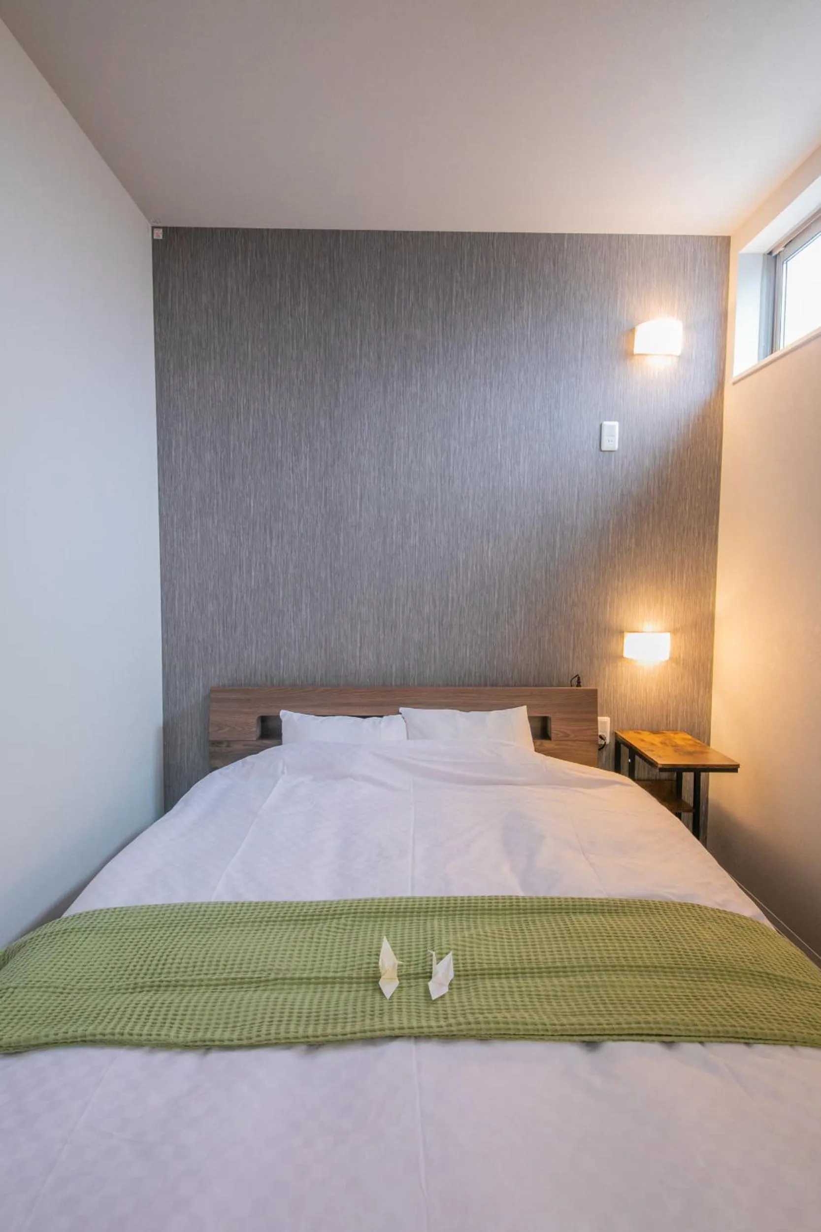 Bed in KIZUNA HOTEL Gojo Kiyomizu-dera Kamogawa