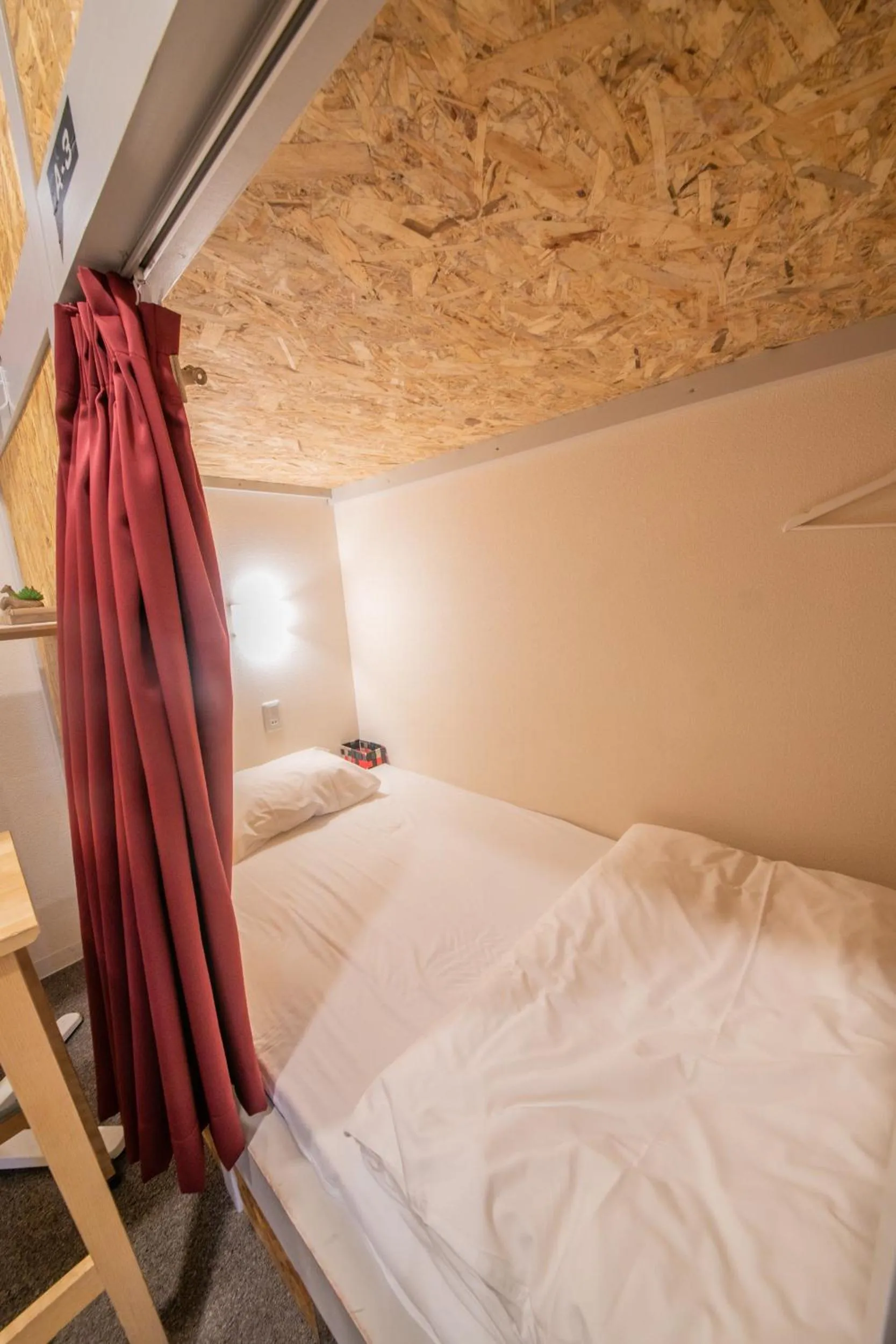 Bed in KIZUNA HOTEL Gojo Kiyomizu-dera Kamogawa