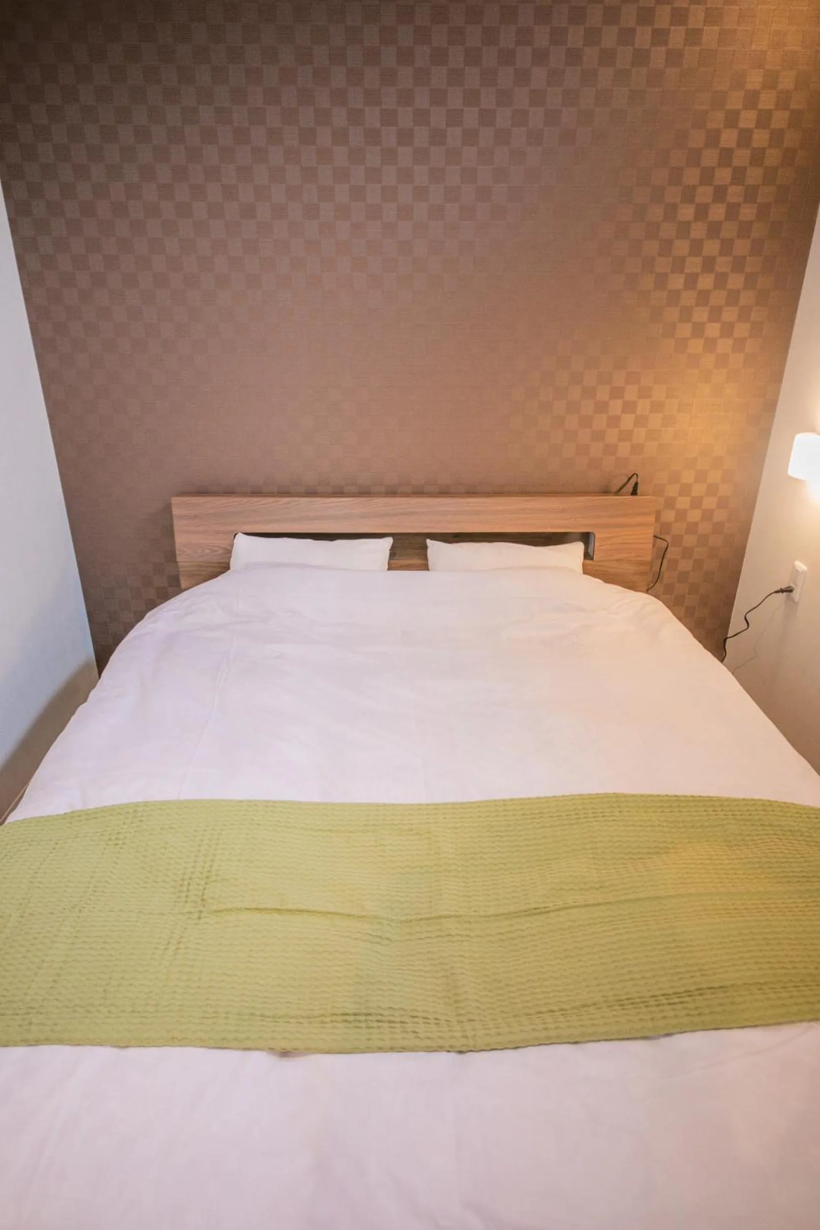 Bed in KIZUNA HOTEL Gojo Kiyomizu-dera Kamogawa