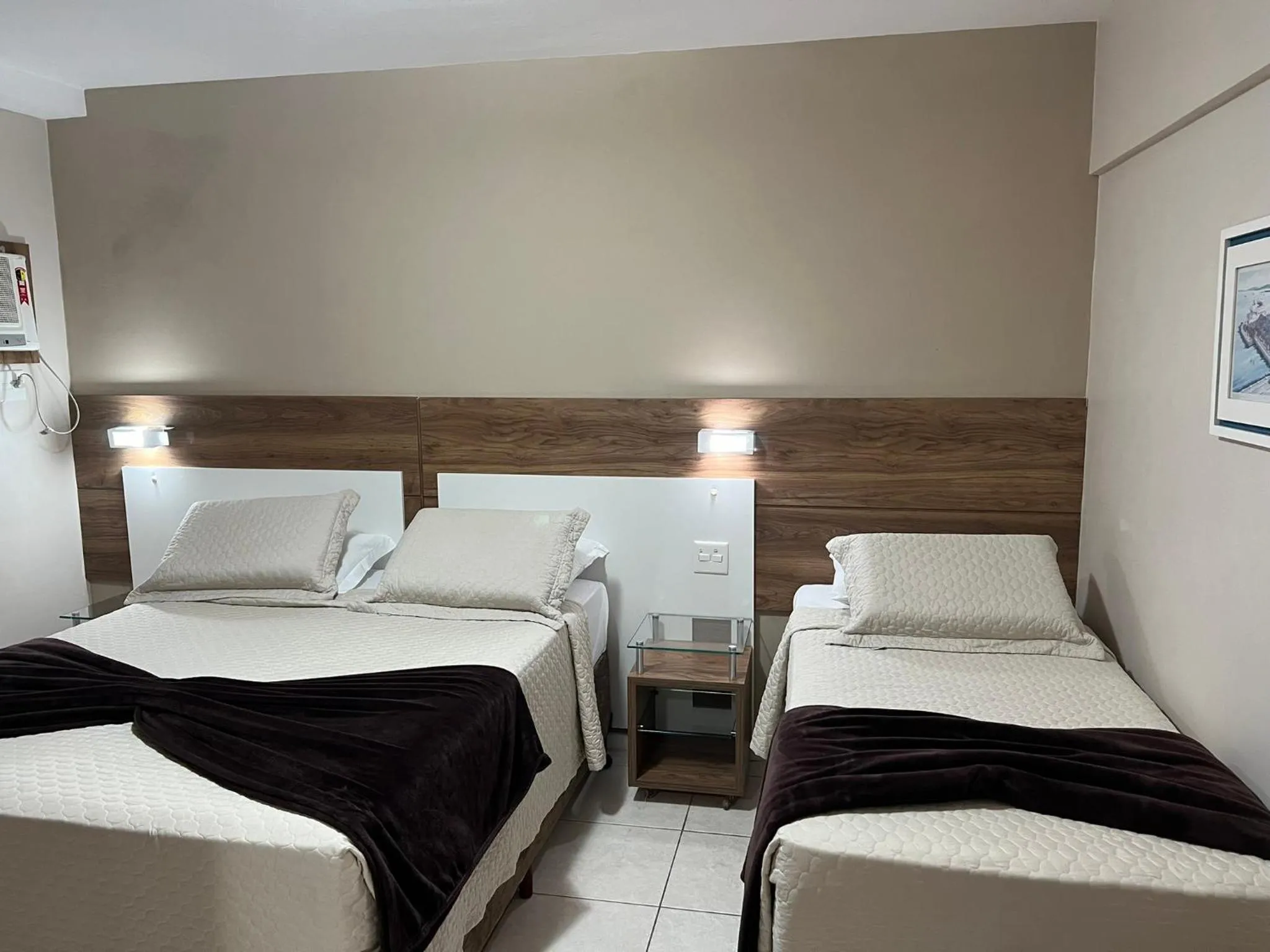 Bed in Brisamar Suite Hotel