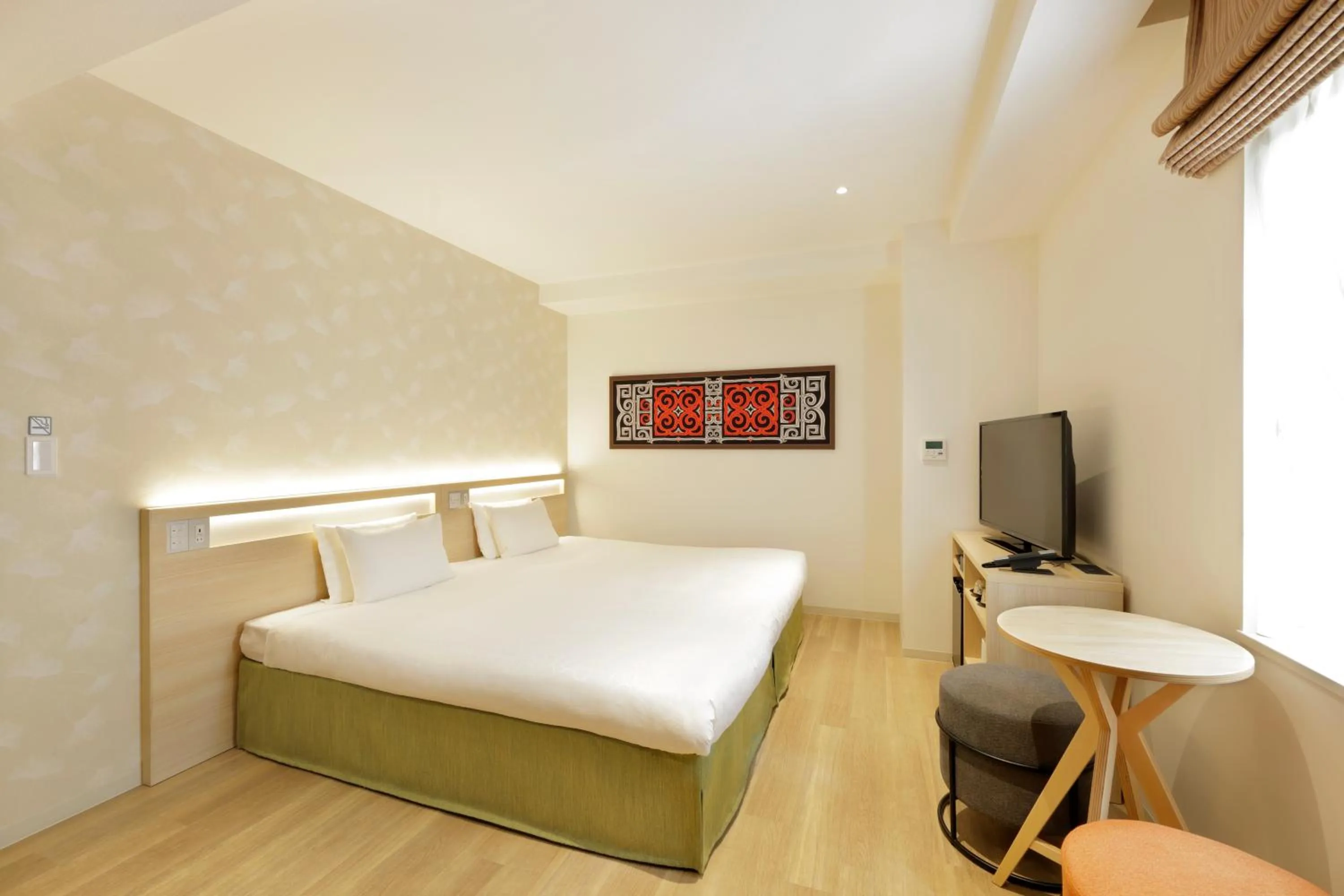 Bed in karaksa hotel Sapporo