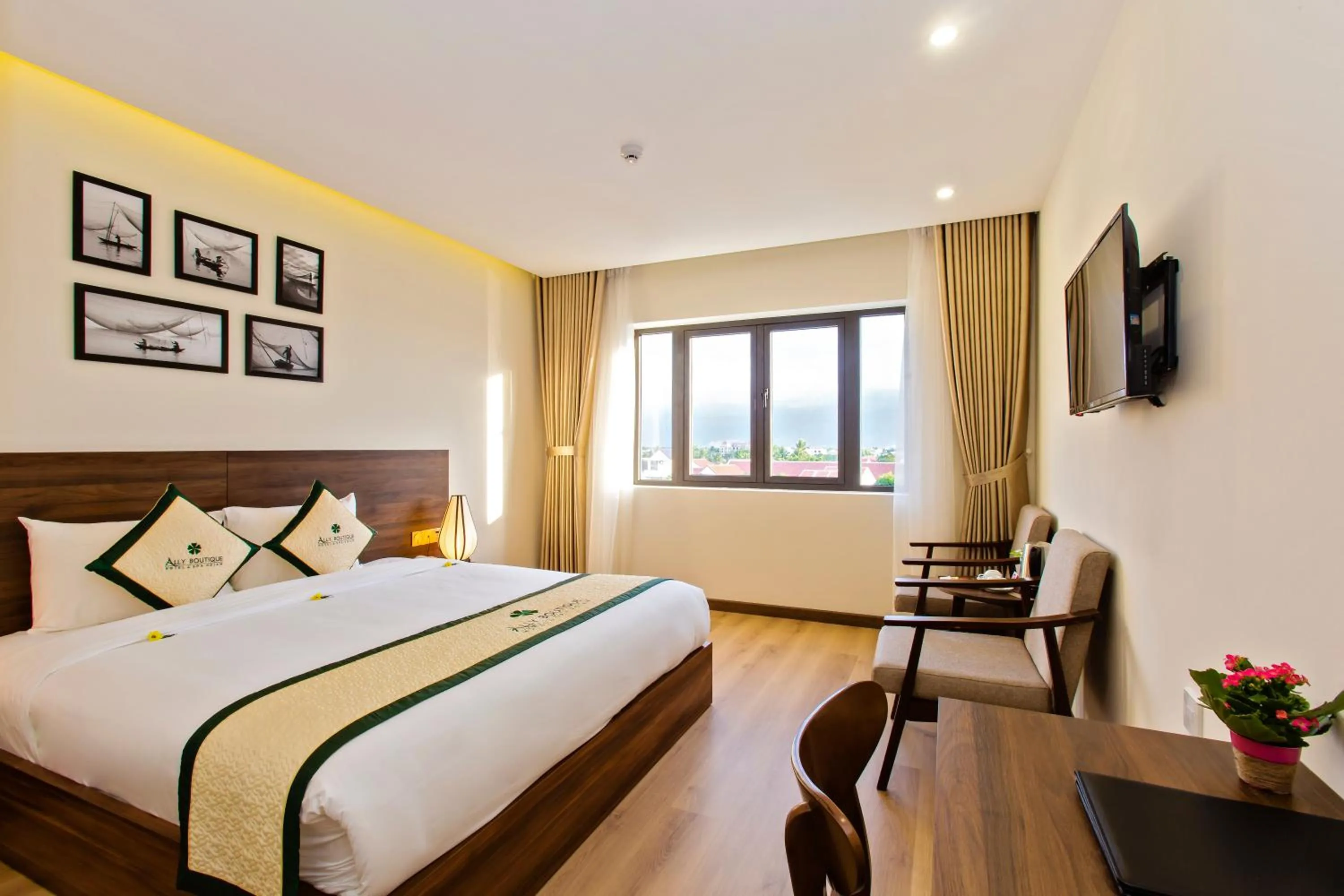 Photo of the whole room, Bed in Ally Beach Boutique Hotel Hoian