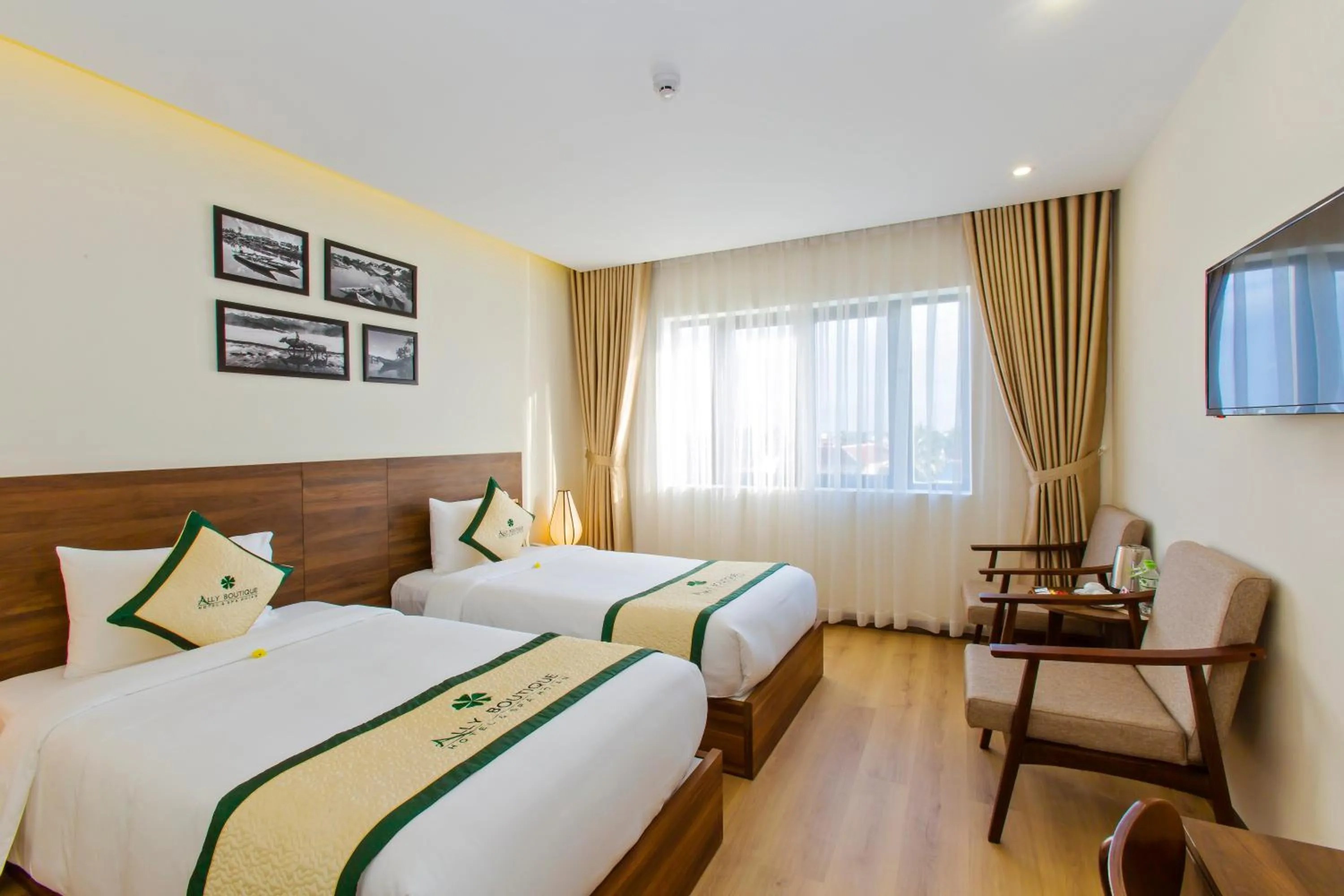 Photo of the whole room, Bed in Ally Beach Boutique Hotel Hoian