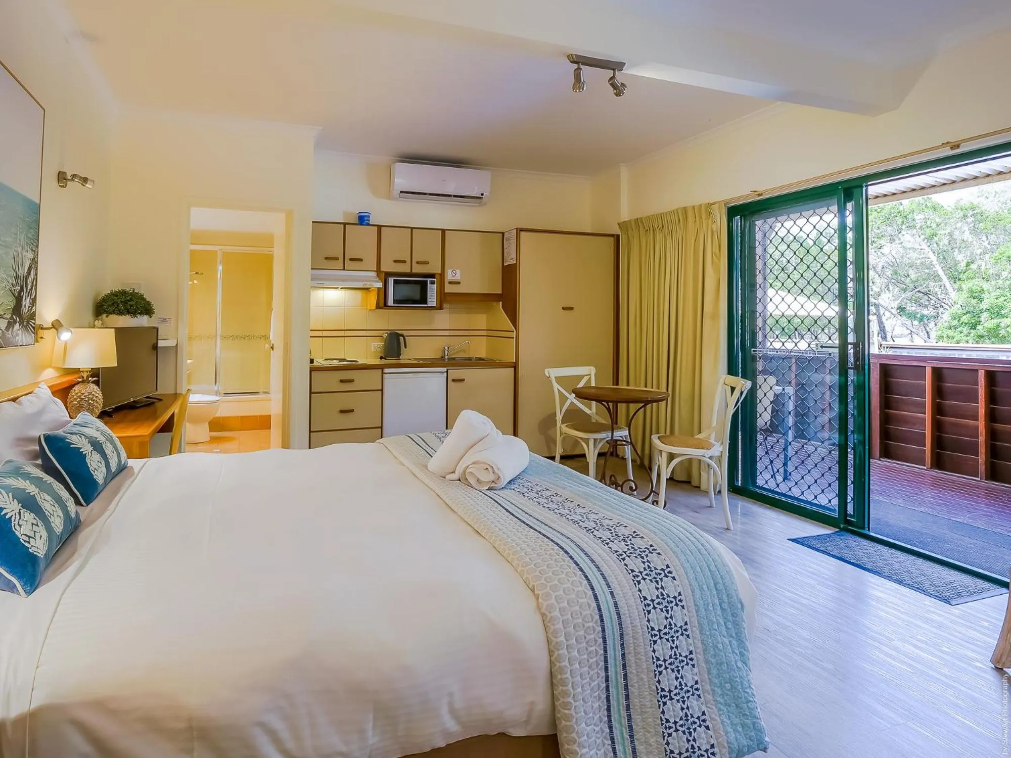 Pool view, Bed in Boat Harbour Studio Apartments and Villas