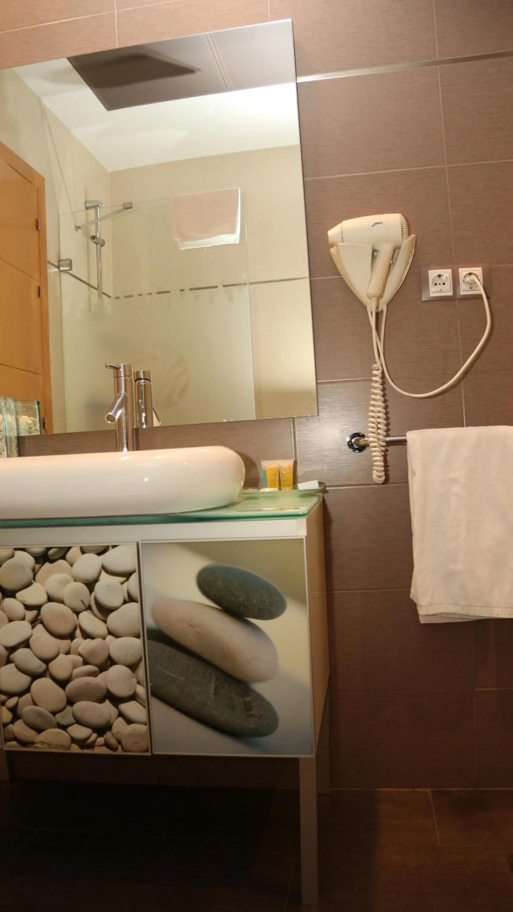 Bathroom in Hotel Macami