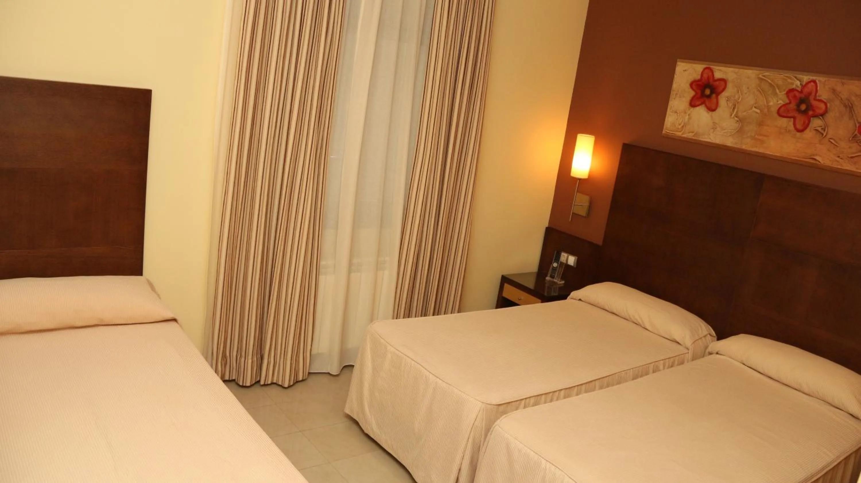 Bedroom, Bed in Hotel Macami