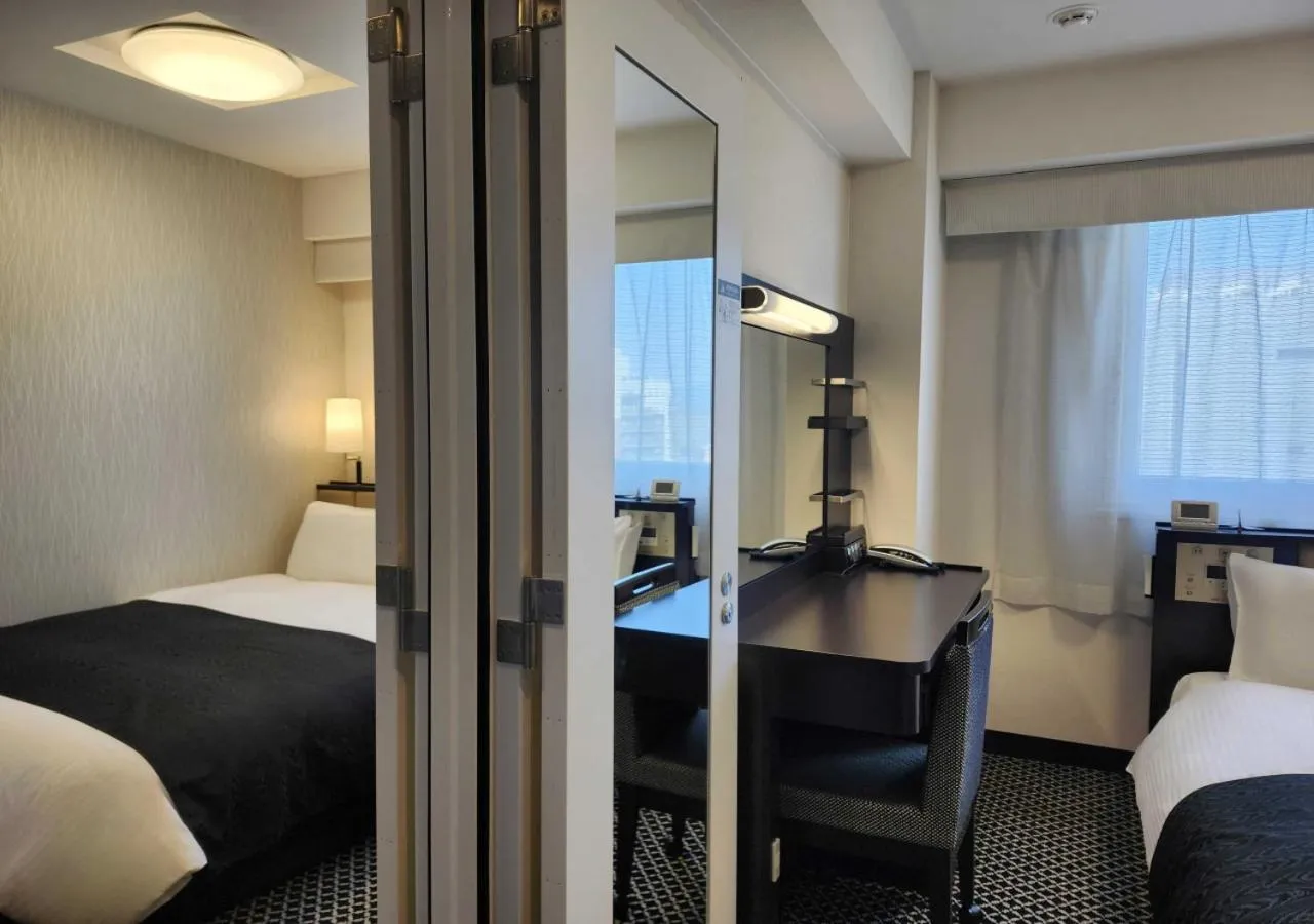 Bed in APA Hotel Kyoto Ekikita