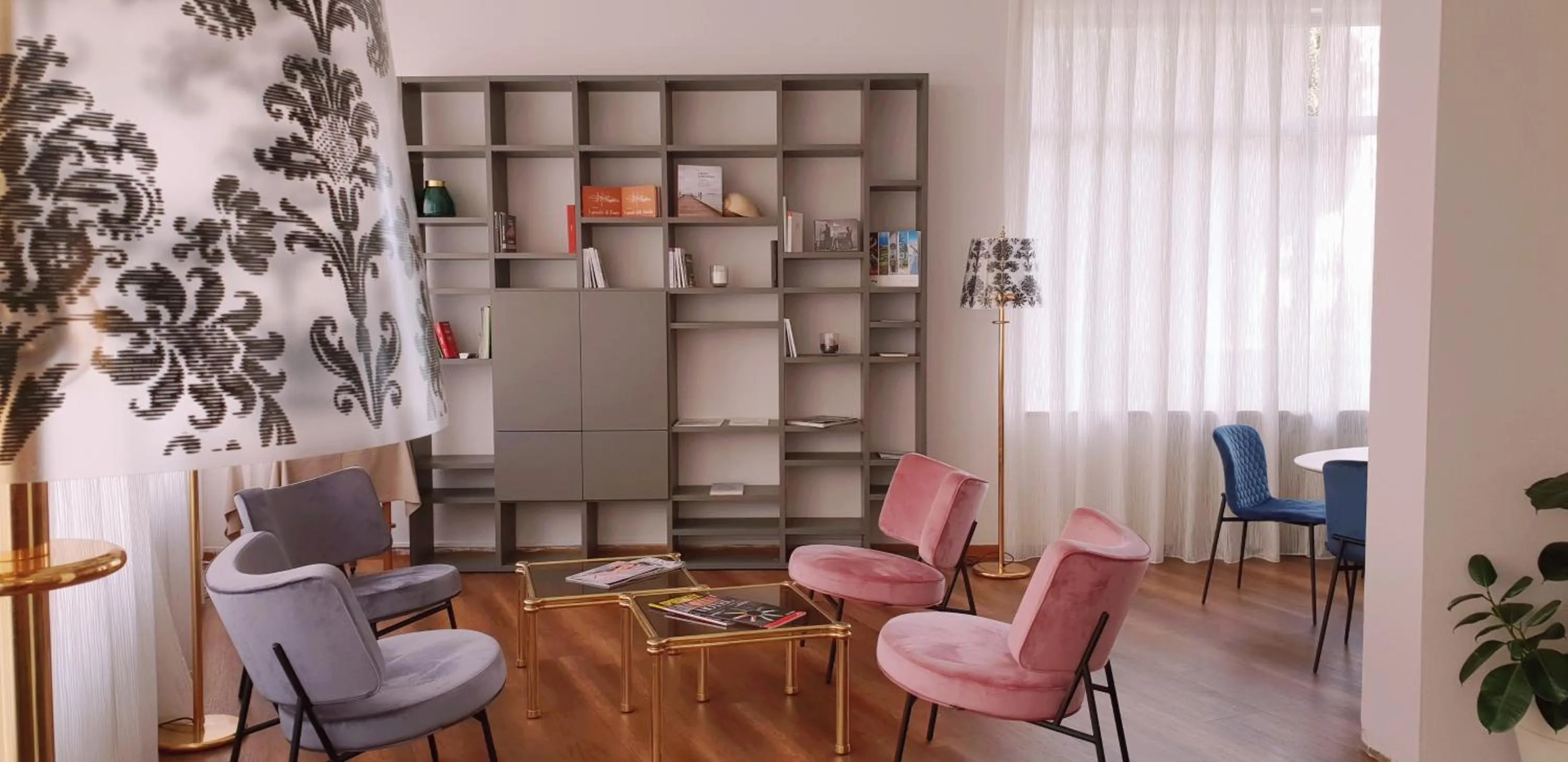 Communal lounge/ TV room in Hotel Augustus