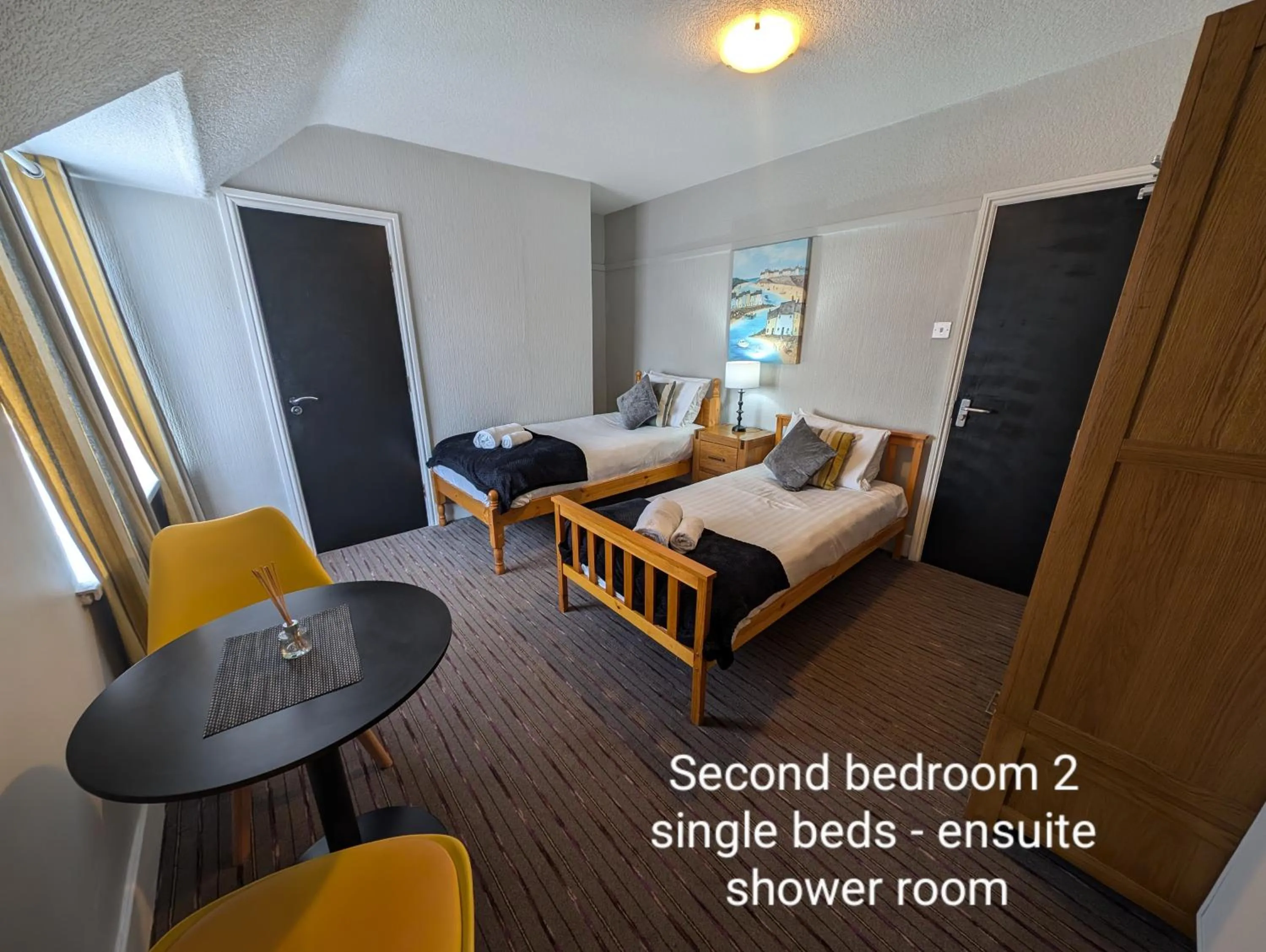 Bed in Coasters Holiday Apartments