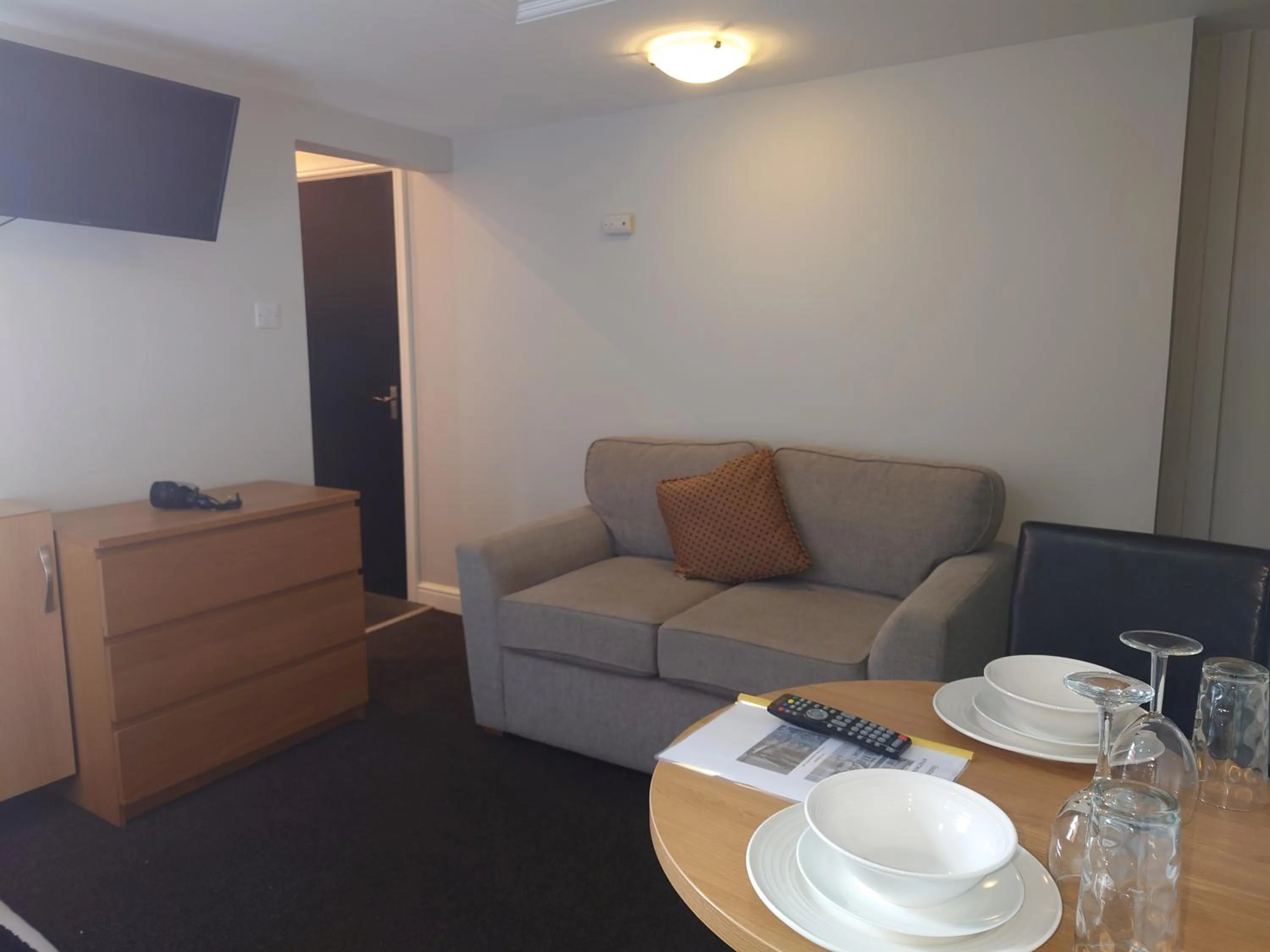 Seating area in Coasters Holiday Apartments