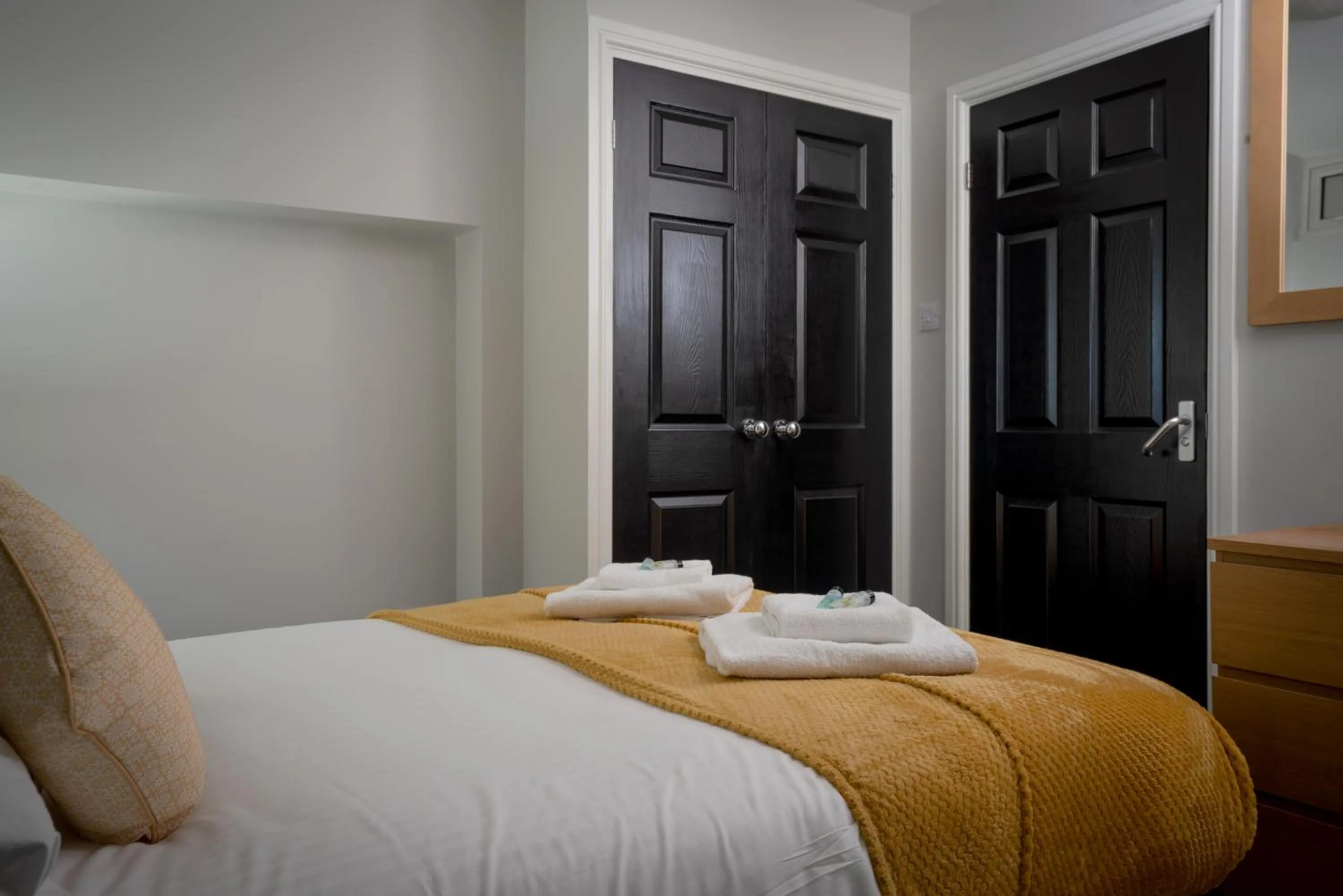 Bed in Coasters Holiday Apartments