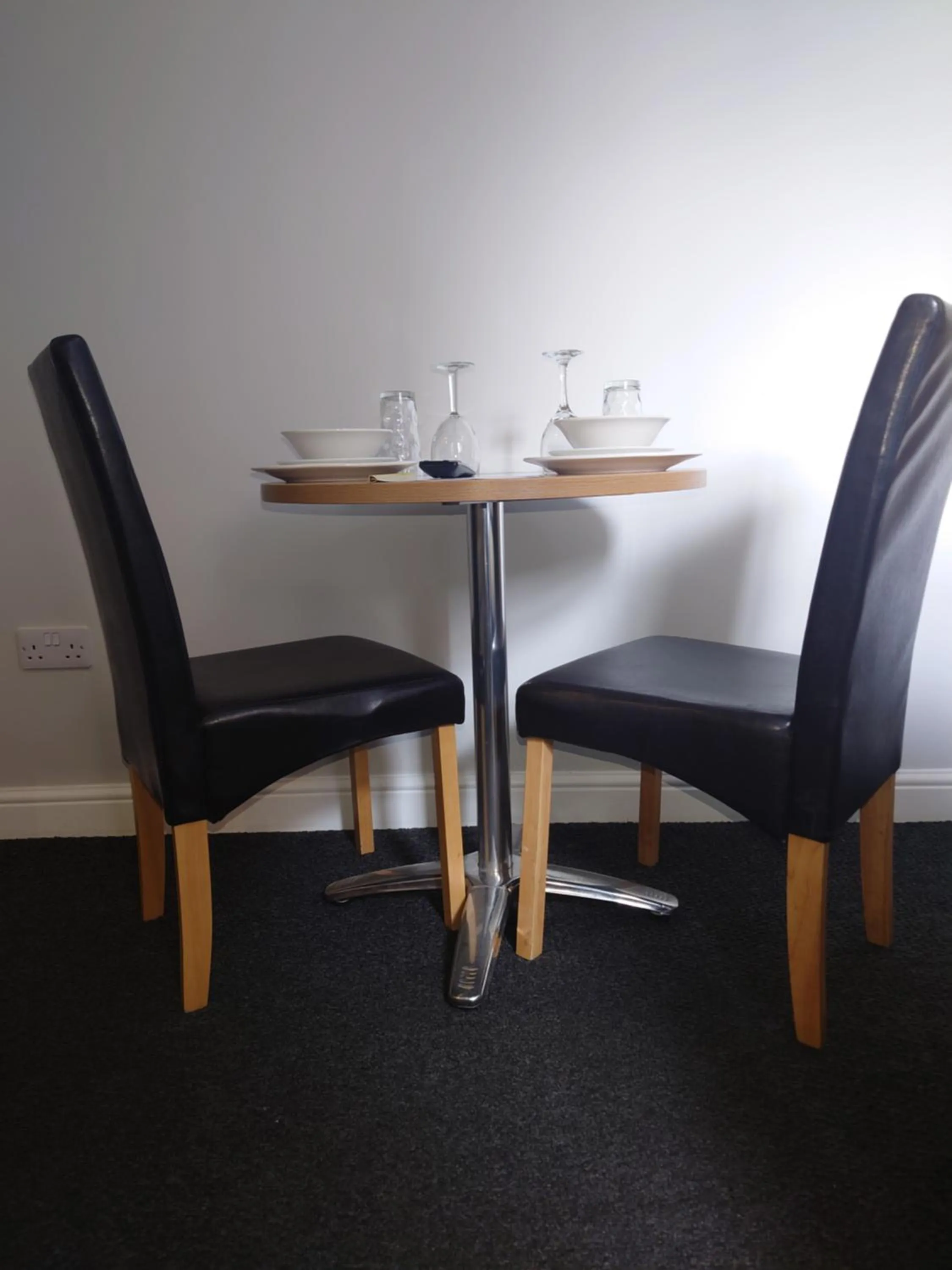 Dining area in Coasters Holiday Apartments