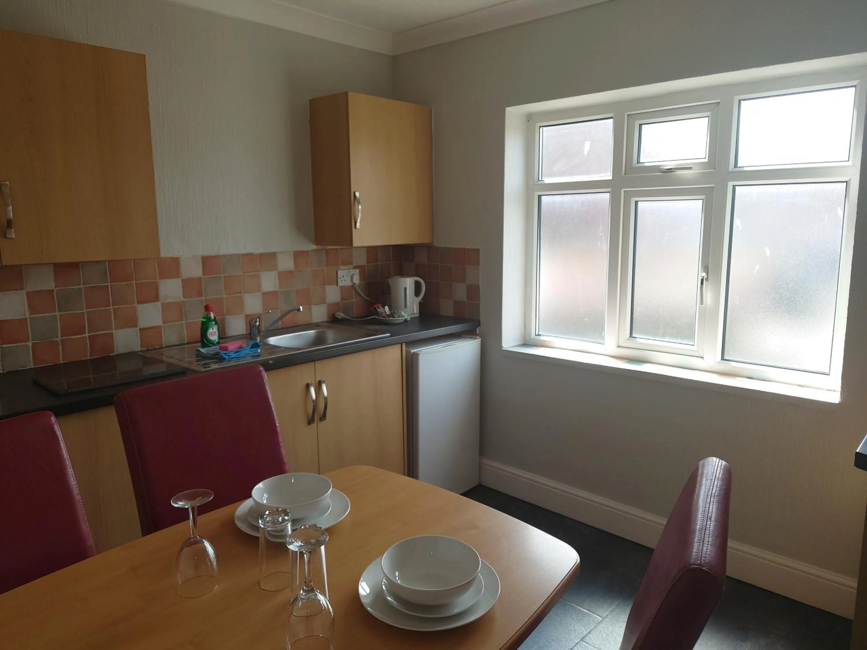 Kitchen or kitchenette in Coasters Holiday Apartments