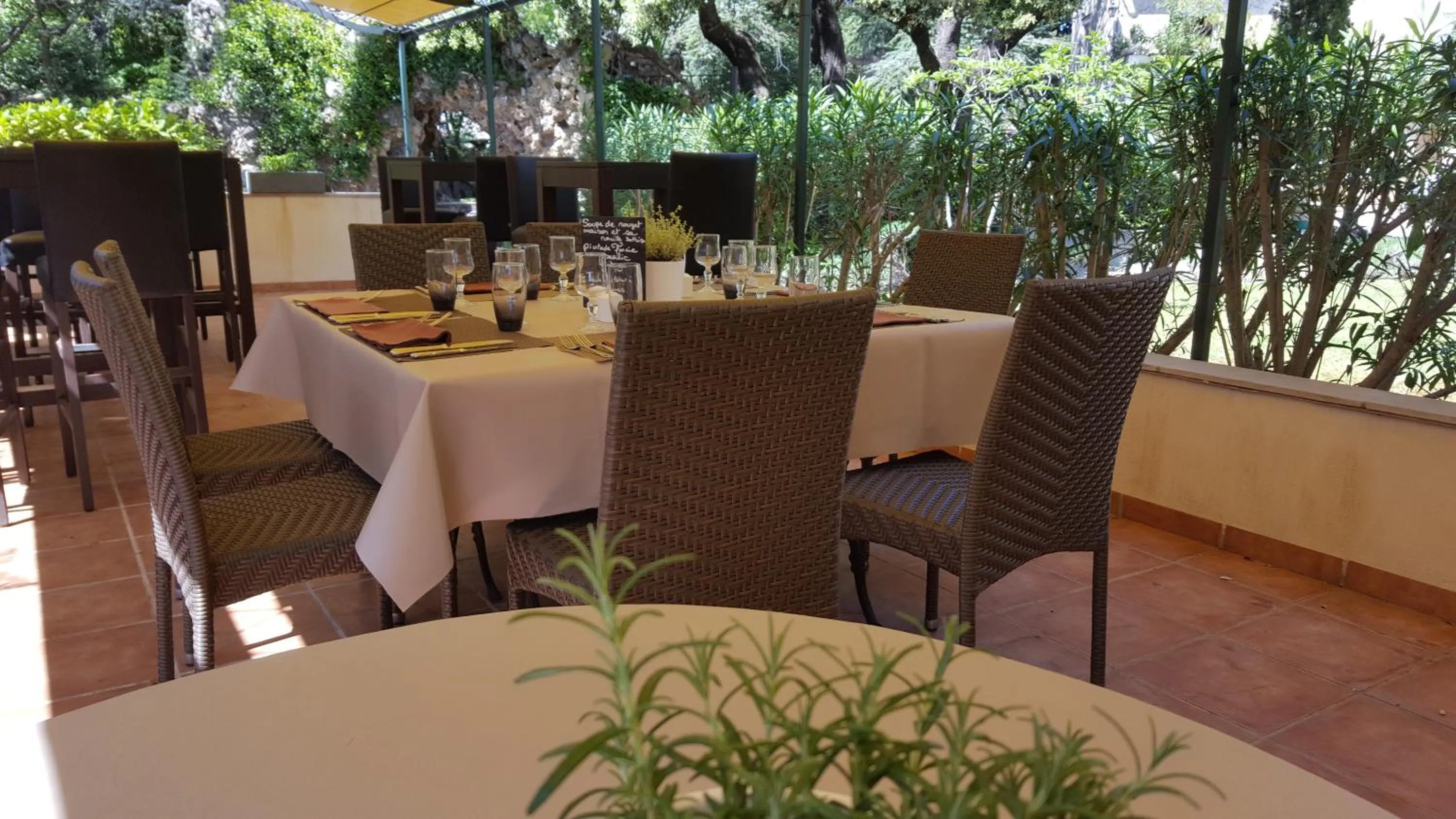Patio in Logis Hôtel - Restaurant Résidence Les Cèdres