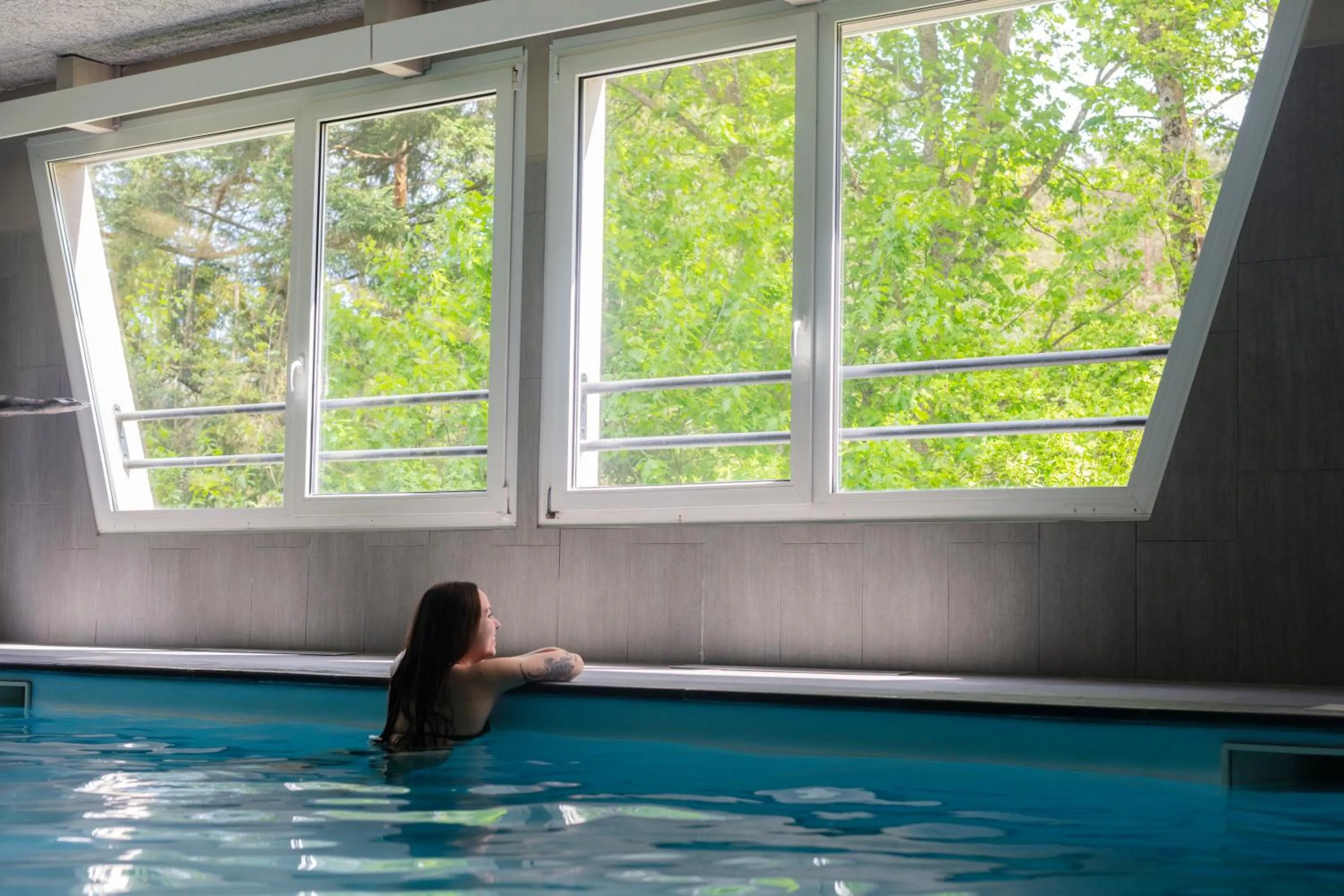 Swimming pool in Hôtel Restaurant La Vallée Noble, proche Eguisheim Colmar