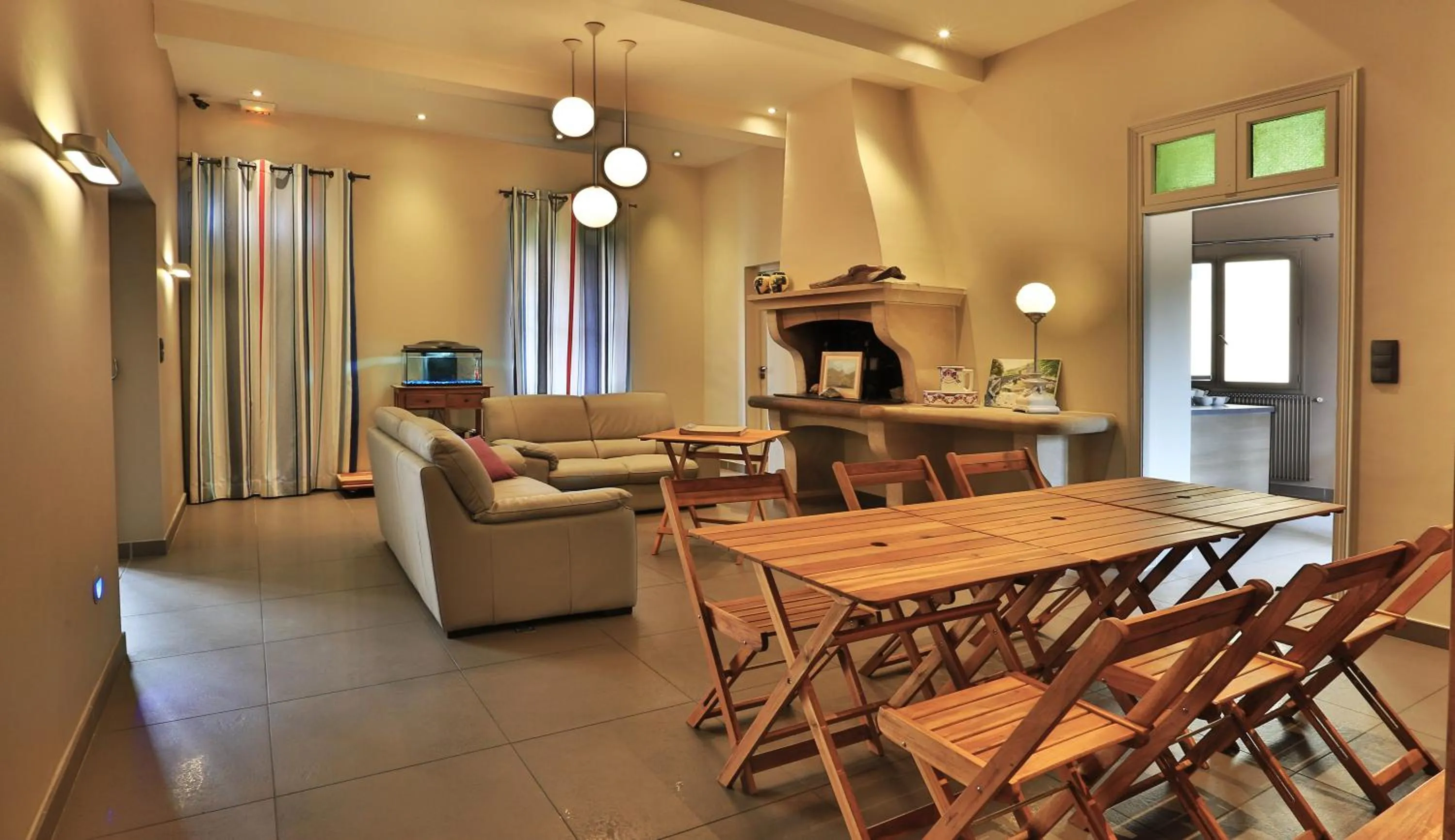 Communal lounge/ TV room in Logis auberge restaurant Du Vigneron