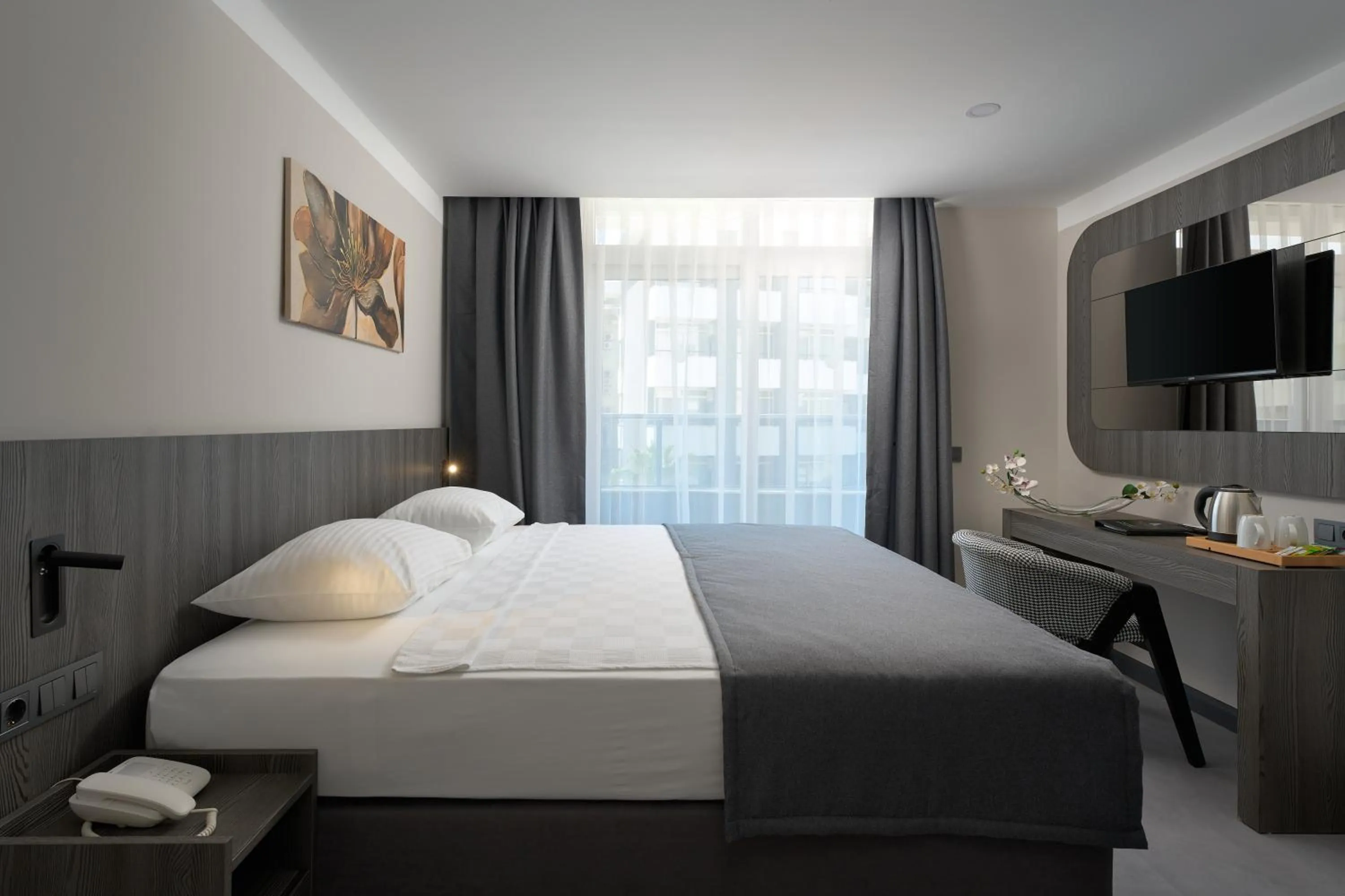 TV and multimedia, Bed in Kaila Krizantem Hotel