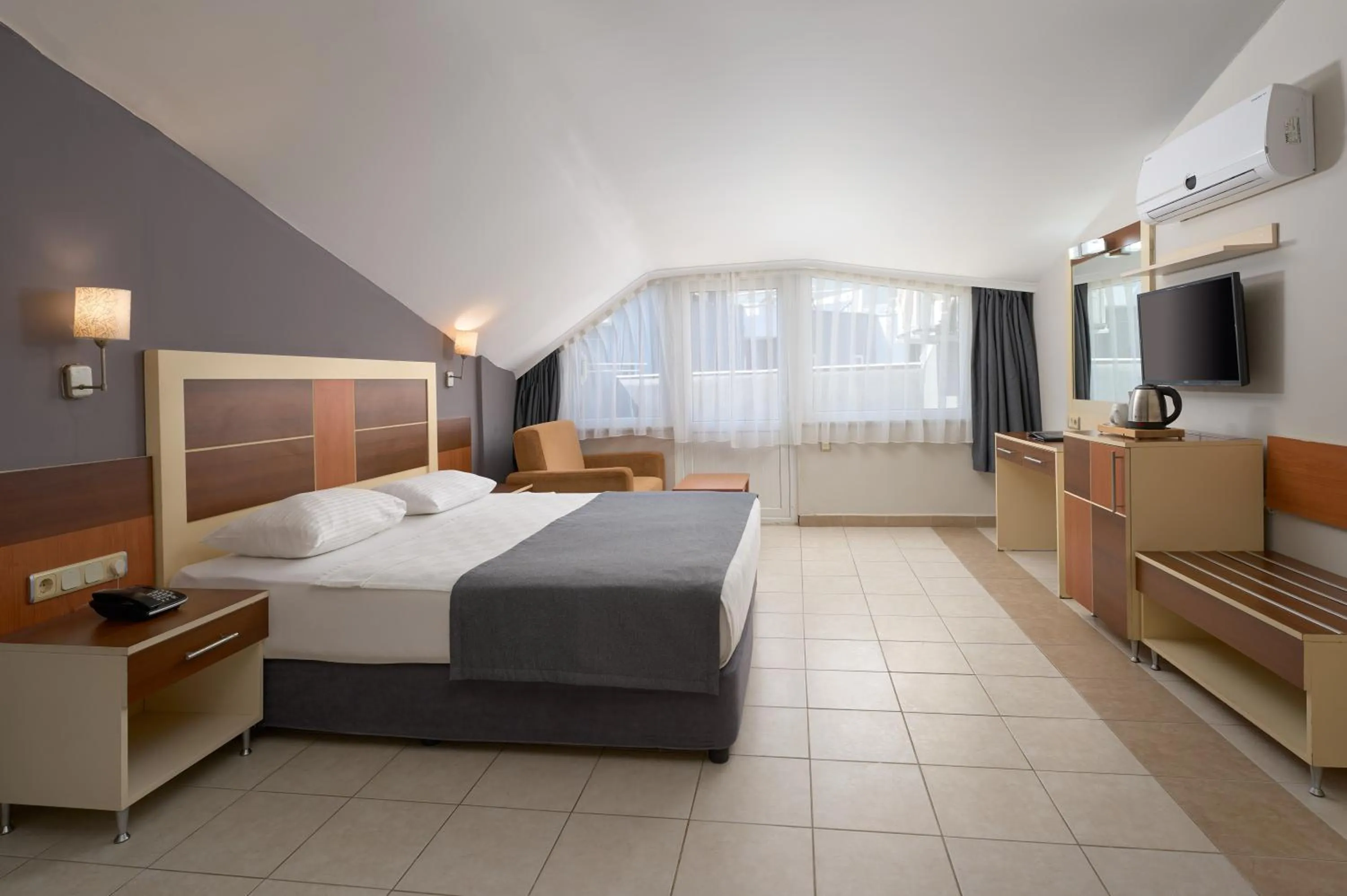 Bed in Kaila Krizantem Hotel