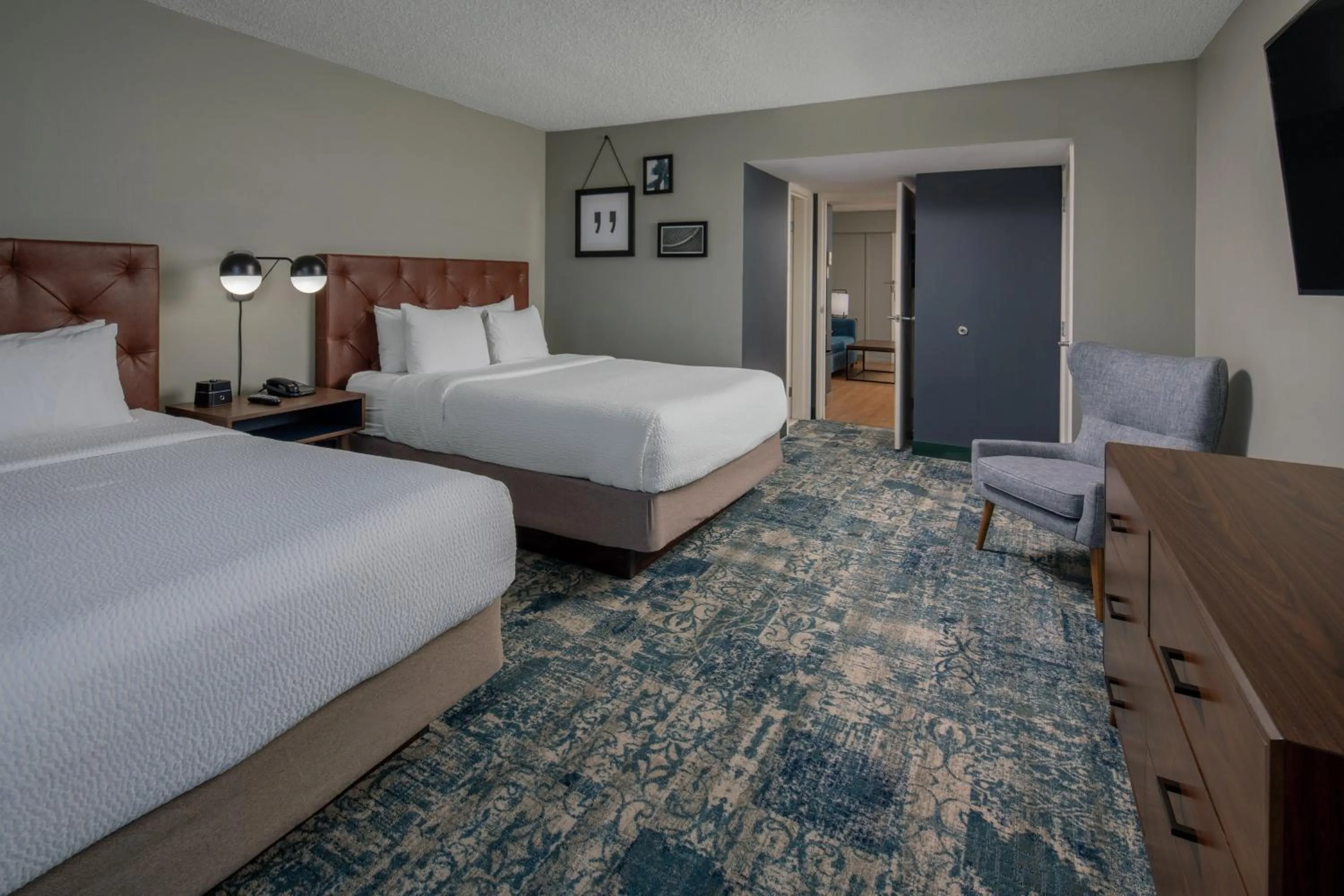 Photo of the whole room, Bed in Four Points by Sheraton Suites Tampa Airport Westshore