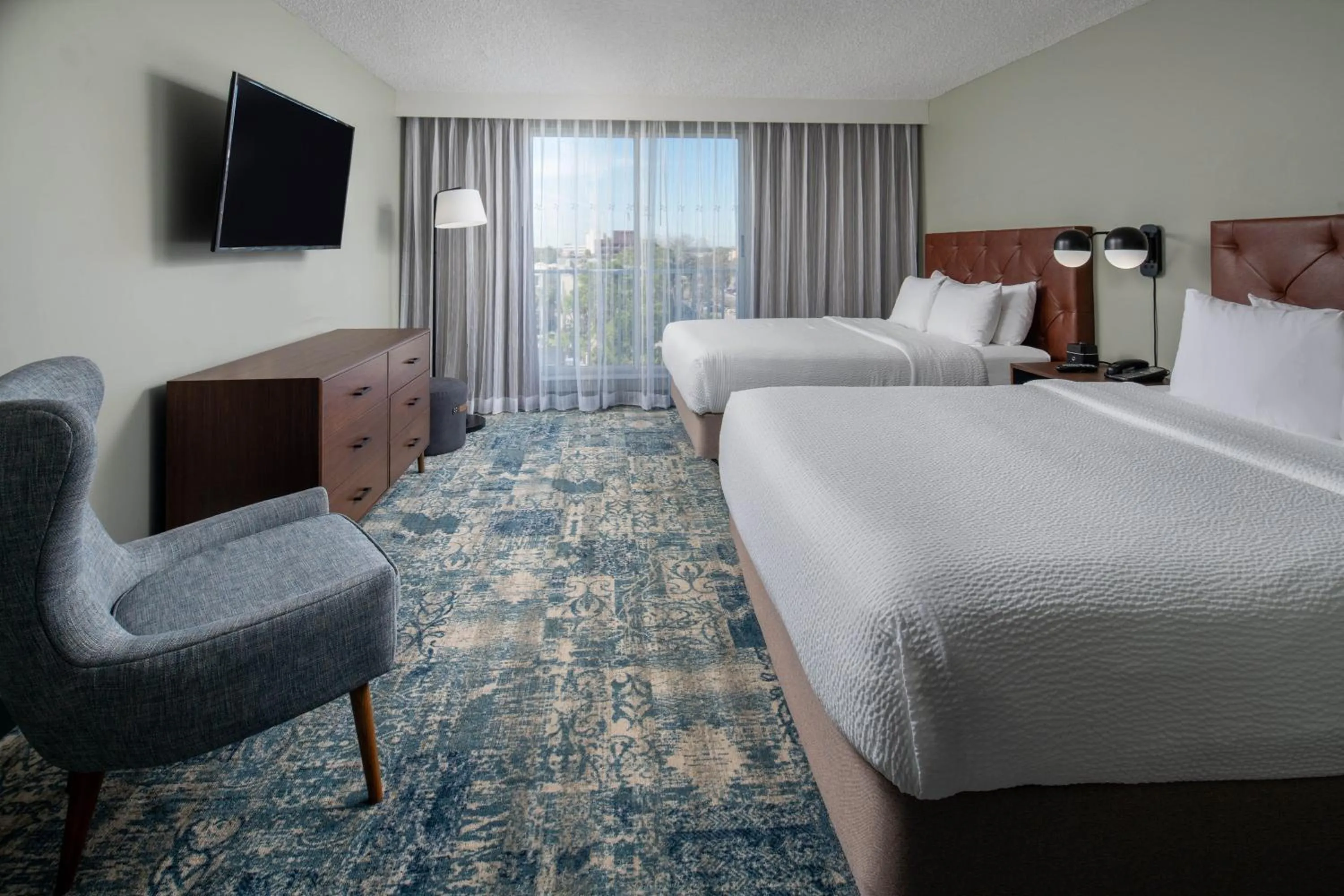 Photo of the whole room, Bed in Four Points by Sheraton Suites Tampa Airport Westshore