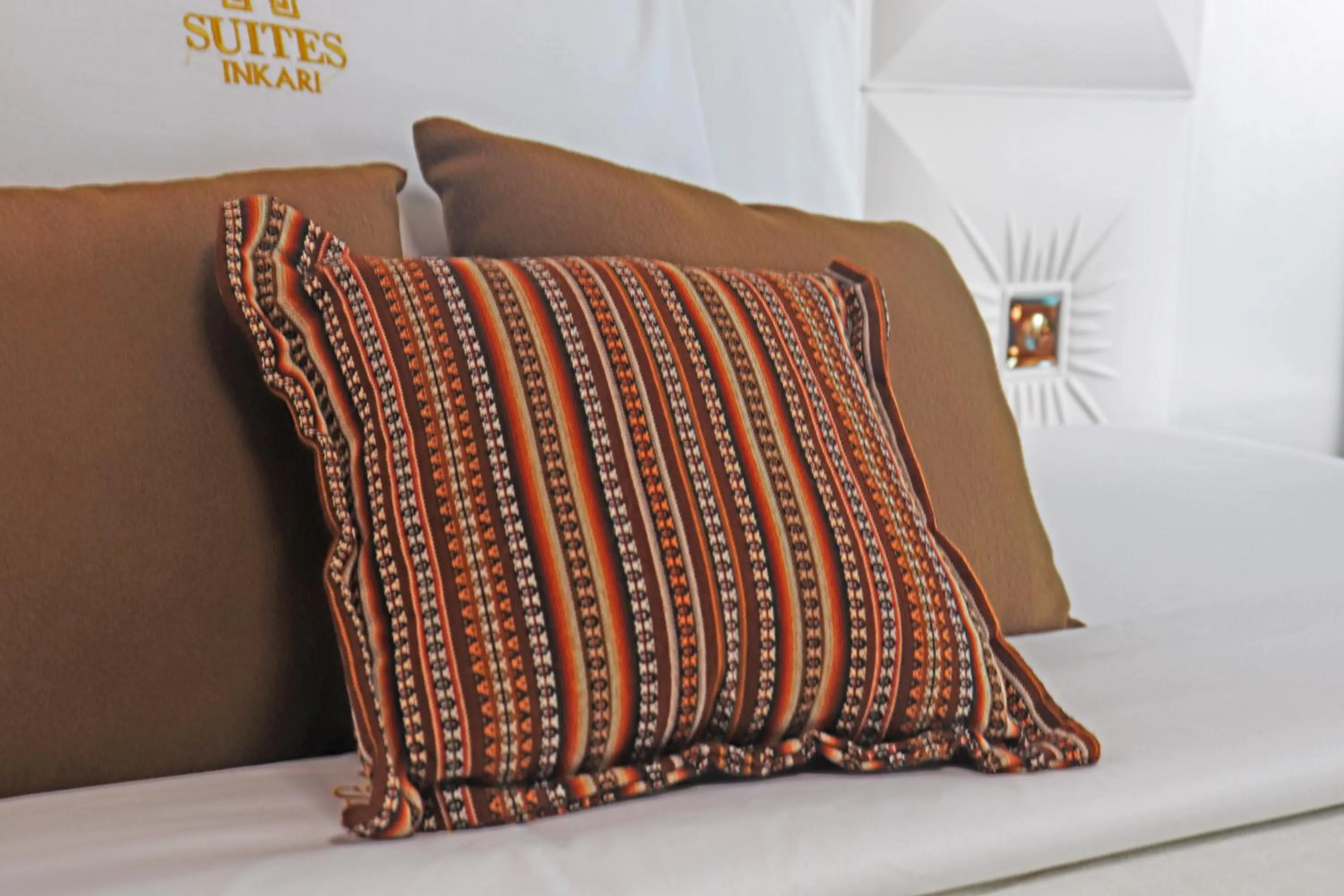 Bed in Inkari Suites Hotel