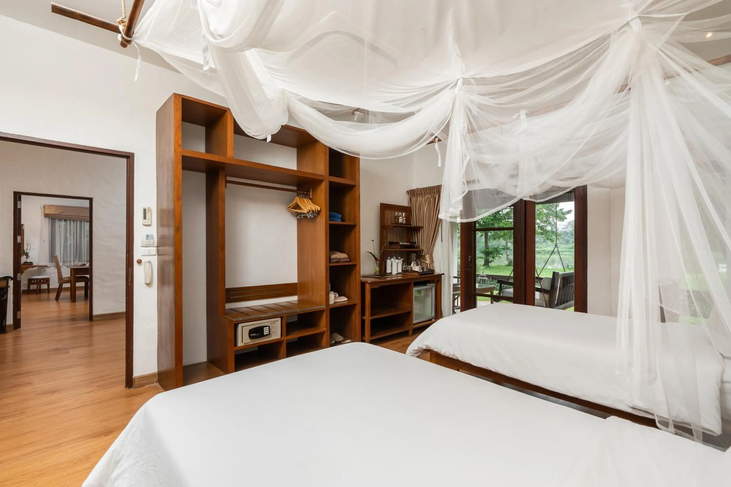 Living room, Bed in The Legend Chiang Rai Boutique River Resort & Spa