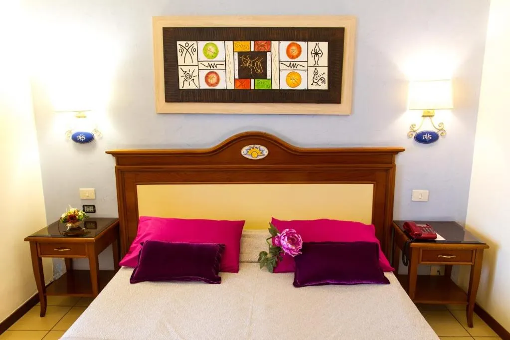 Bed in Hotel Riva Del Sole