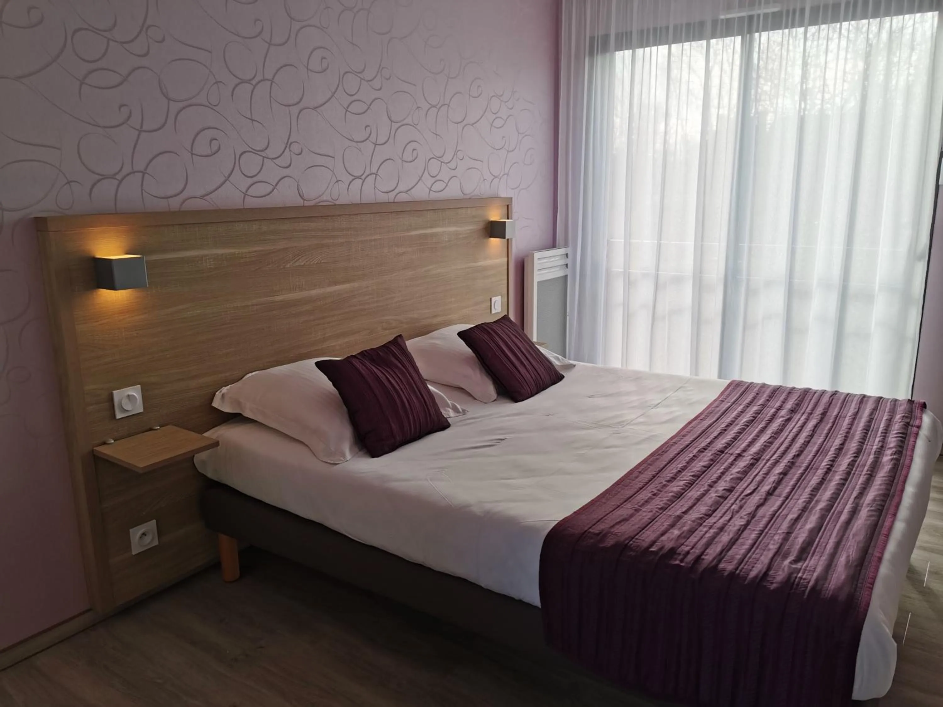 Bed in Hotel Logis Au Moyne de Saire